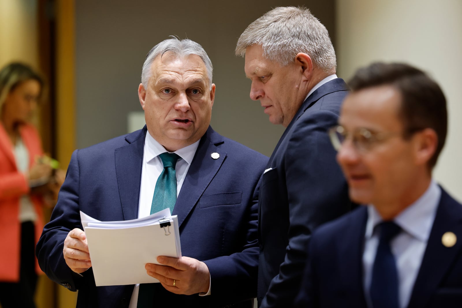 FILE - Slovakia's Prime Minister Robert Fico, right, talks to Hungary's Prime Minister Viktor Orban during a round table meeting at an EU summit in Brussels, on Feb. 1, 2024. (AP Photo/Geert Vanden Wijngaert, File)