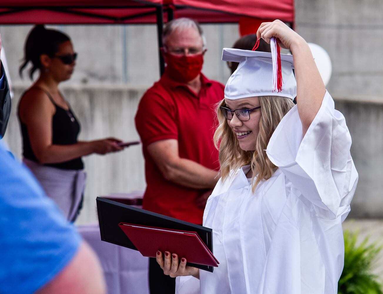 Madison High School drive-thru graduation ceremony at Land of Illusion