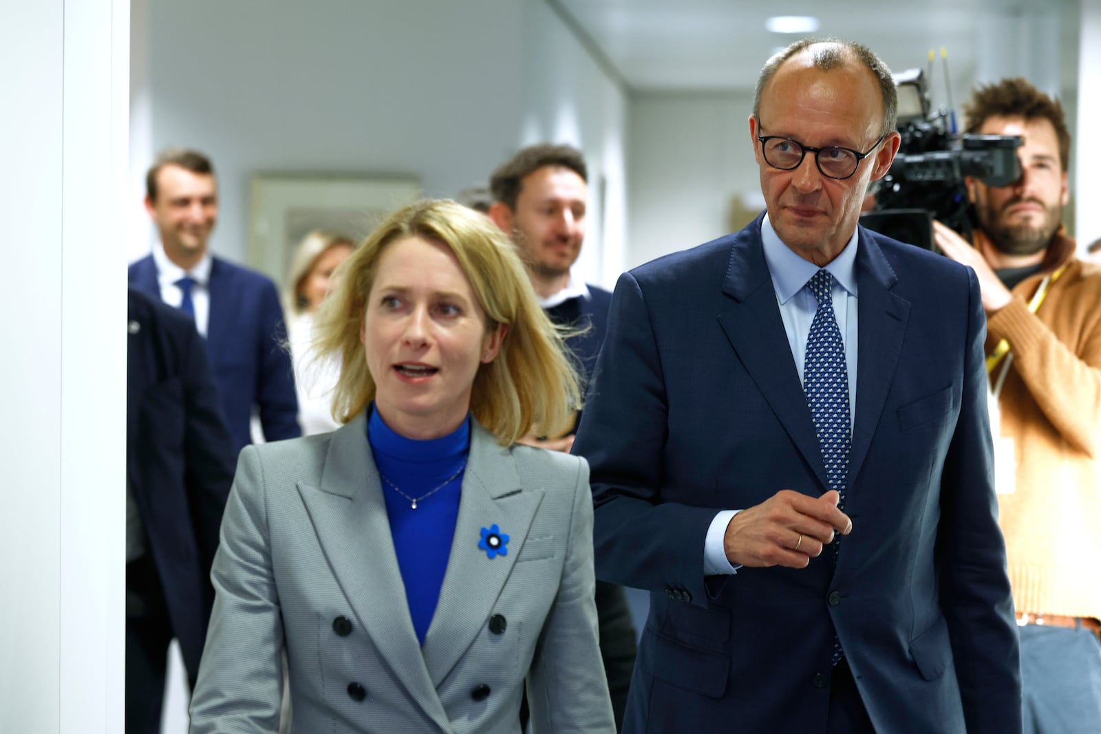 European Union foreign policy chief Kaja Kallas, left, walks with Friedrich Merz, leader of the Christian Democratic Union, as they arrive for a meeting in Brussels, Wednesday, March 5, 2025. (AP Photo/Omar Havana)