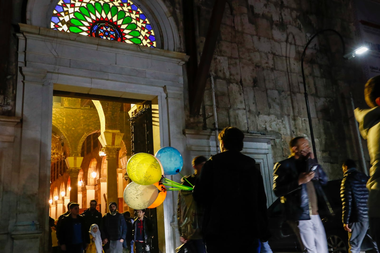 Worshippers exit the Umayyad Mosque after prayers on the first day of the Muslim holy month of Ramadan in Damascus, Syria, Saturday March 1, 2025.(AP Photo/Omar Sanadiki)