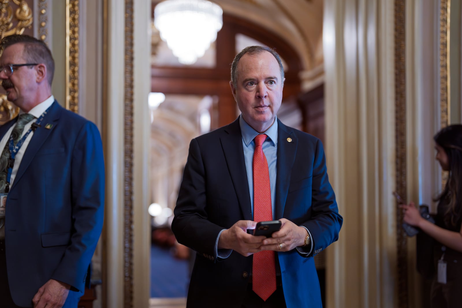 Sen. Adam Schiff, D-Calif., arrives as Senate Democrats gather behind closed doors to mount a last-ditch protest over a Republican-led spending bill that already passed the House, at the Capitol in Washington, Thursday, March 13, 2025. (AP Photo/J. Scott Applewhite)