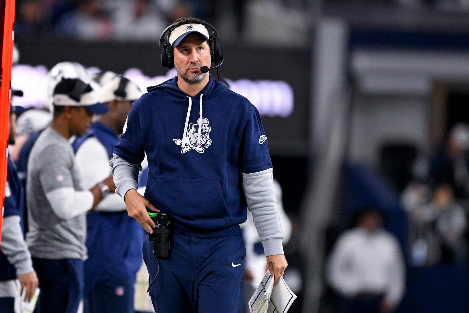 FILE - Dallas Cowboys offensive coordinator Brian Schottenheimer looks on from the sidelines during an NFL football game against the New York Giants in Arlington, Texas, Thursday, Nov. 28, 2024. (AP Photo/Jerome Miron, File)