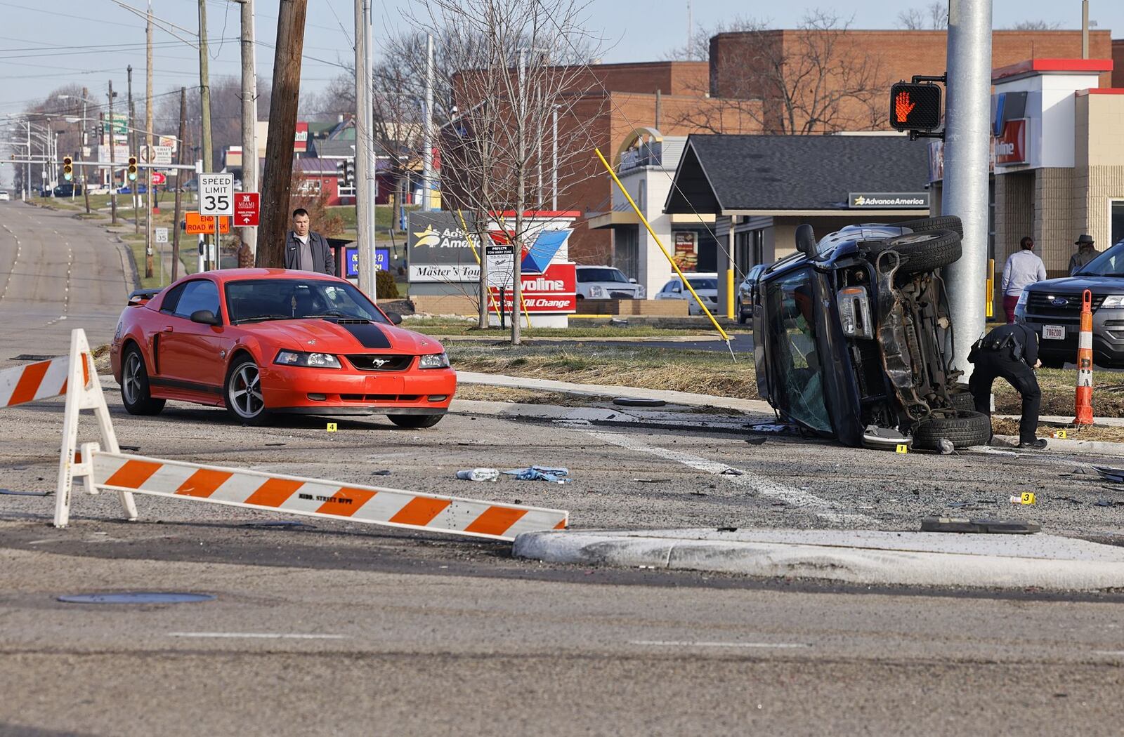 A Middletown man, Sean McPherson, 37, allegedly ran from police Tuesday morning and was involved in this crash at the intersection of Roosevelt and Breiel boulevards. NICK GRAHAM/STAFF