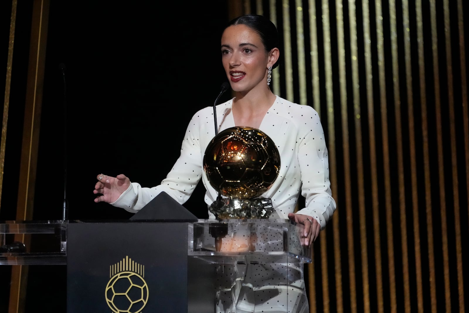 Barcelona's Aitana Bonmati delivers her speech as she receives the 2024 Women's Ballon d'Or award during the 68th Ballon d'Or (Golden Ball) award ceremony at Theatre du Chatelet in Paris, Monday, Oct. 28, 2024. (AP Photo/Michel Euler)