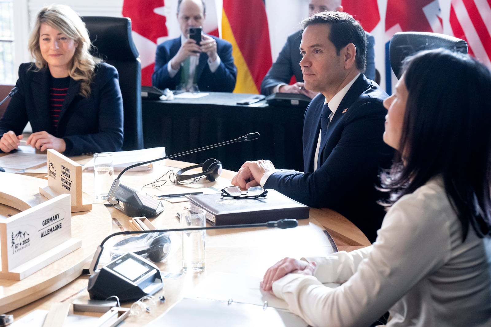 Germany's Foreign Minister Annalena Baerbock, from right, U.S. Secretary of State Marco Rubio and Canada's Foreign Minister Melanie Joly attend the G7 foreign ministers meeting in La Malbaie, Quebec, Canada, Thursday, March 13, 2025. (Saul Loeb/Pool via AP)