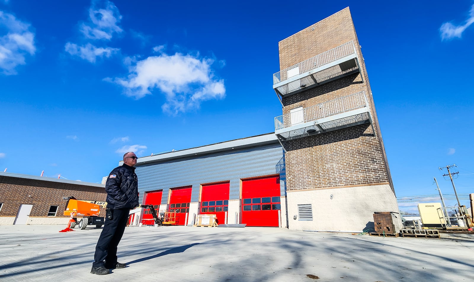 Fire Cheif Tom Snively gives a tour as construction continues on the new Middletown Division of Fire headquarters Station 83 Thursday, Jan. 2, 2025 on Yankee Road in Middletown. This station and station 82 on Ohio 122 east of I-75 will be the first of the four new fire stations to be completed. NICK GRAHAM/STAFF