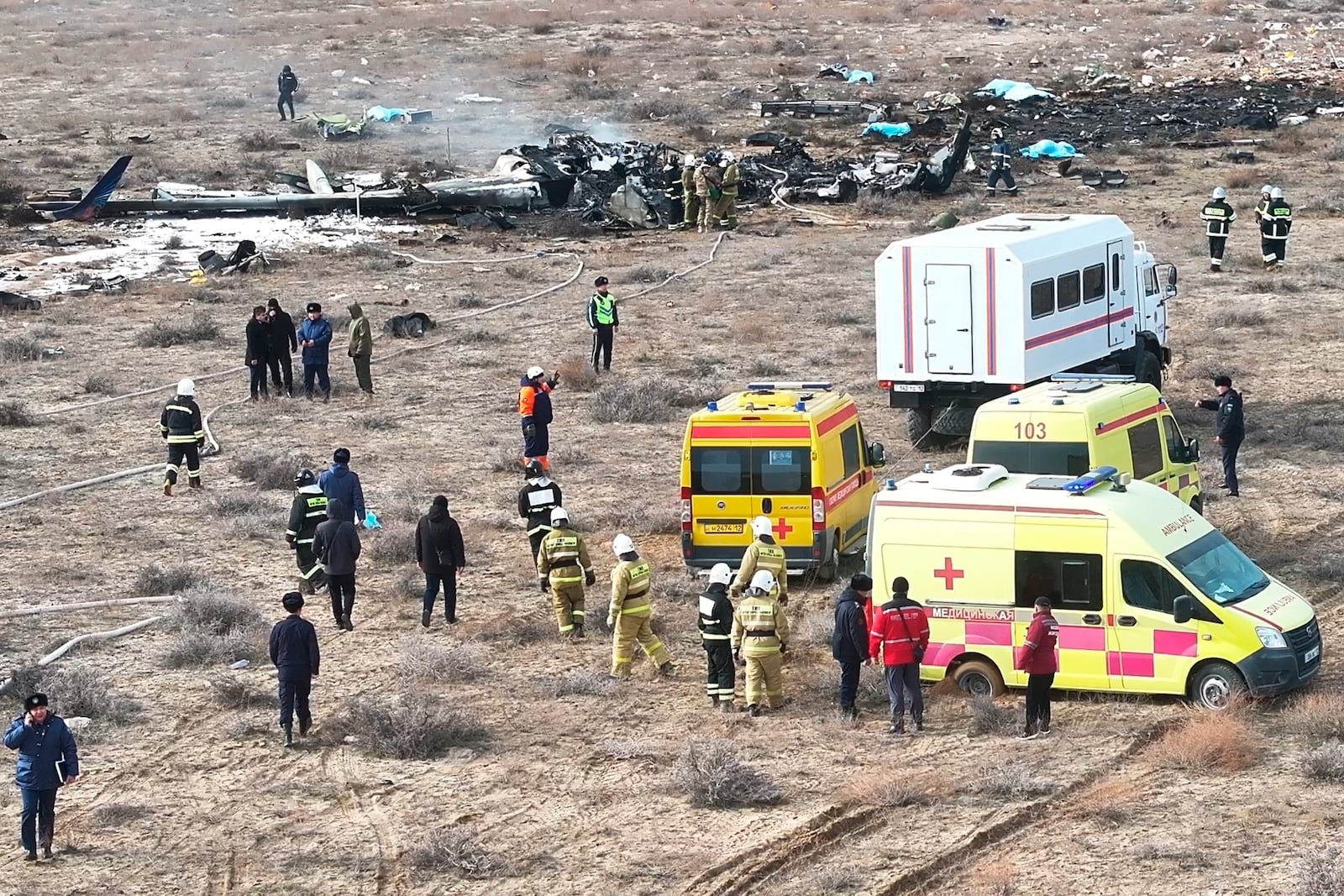 The wreckage of Azerbaijan Airlines Embraer 190 lays on the ground near the airport of Aktau, Kazakhstan, Wednesday, Dec. 25, 2024. (AP Photo/Azamat Sarsenbayev)