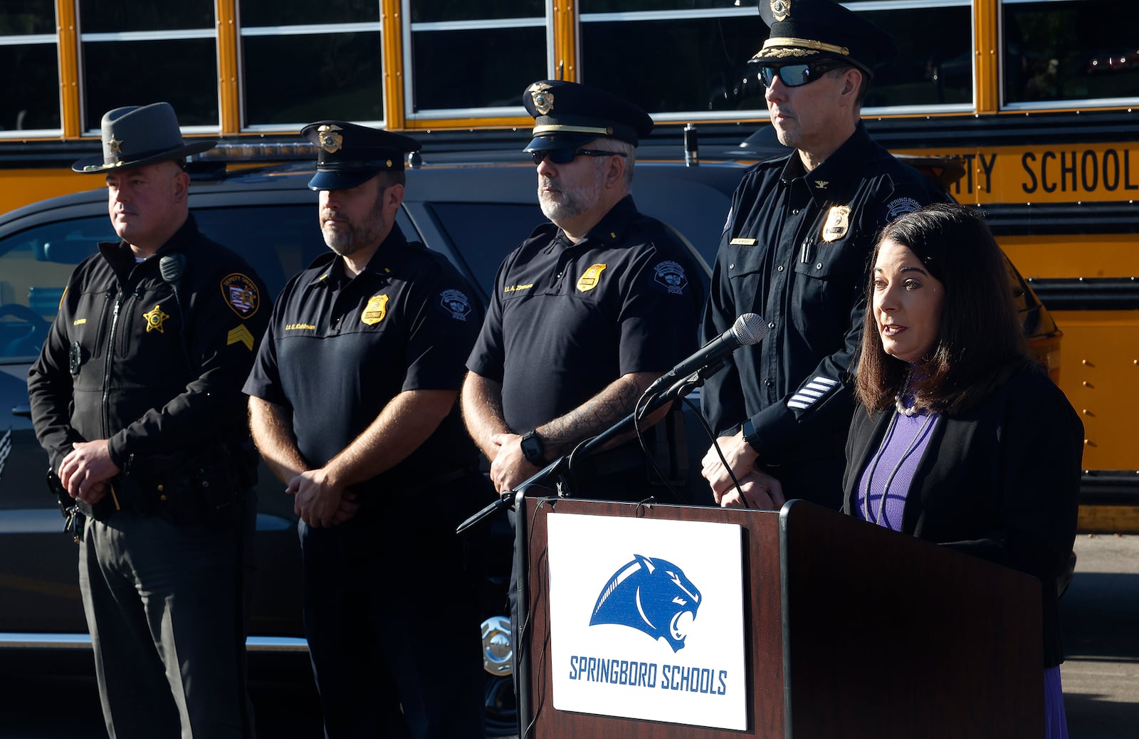 Springboro Schools superintendent Carrie Hester spoke at the high school, Monday, Oct. 21, 2024 during the Ohio State Highway Patrol’s Press Conference on National School Bus Safety Week.  This year’s theme, “Safety First, Safety Always,” serves as a vital reminder for both motorists and students about the potential dangers surrounding school buses. MARSHALL GORBY\STAFF