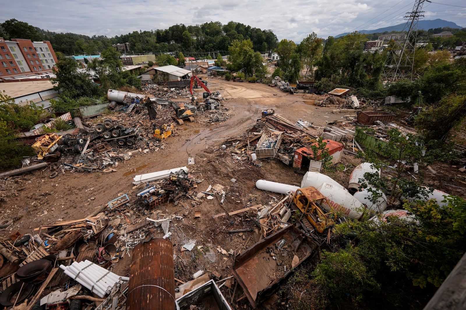 FILE - Debris is seen in the aftermath of Hurricane Helene, Monday, Sept. 30, 2024, in Asheville, N.C. (AP Photo/Mike Stewart)