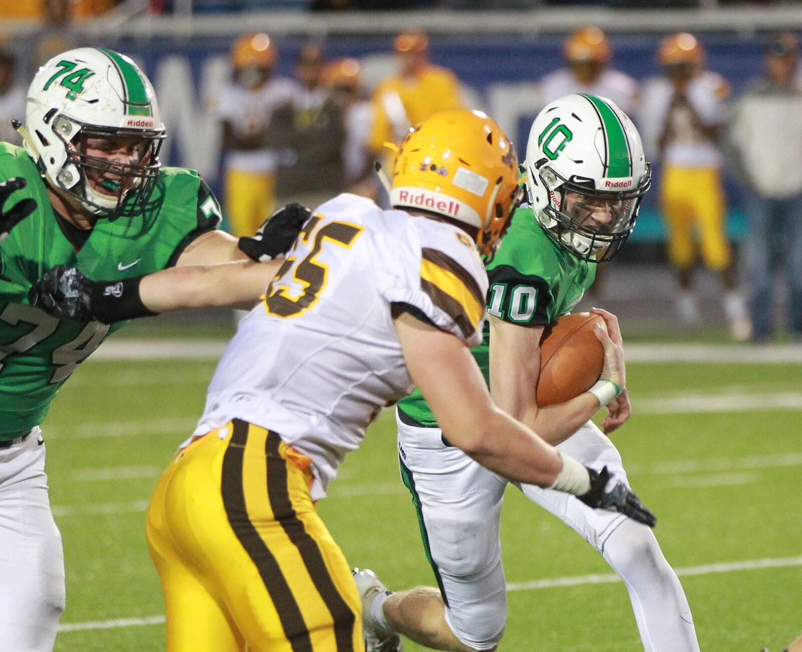 Badin QB Zach Switzer (right) had three TD passes and caught another. Badin defeated visiting Alter 42-7 in a Week 6 high school football game at Virgil Schwarm Stadium on Friday, Oct. 4, 2019. MARC PENDLETON / STAFF