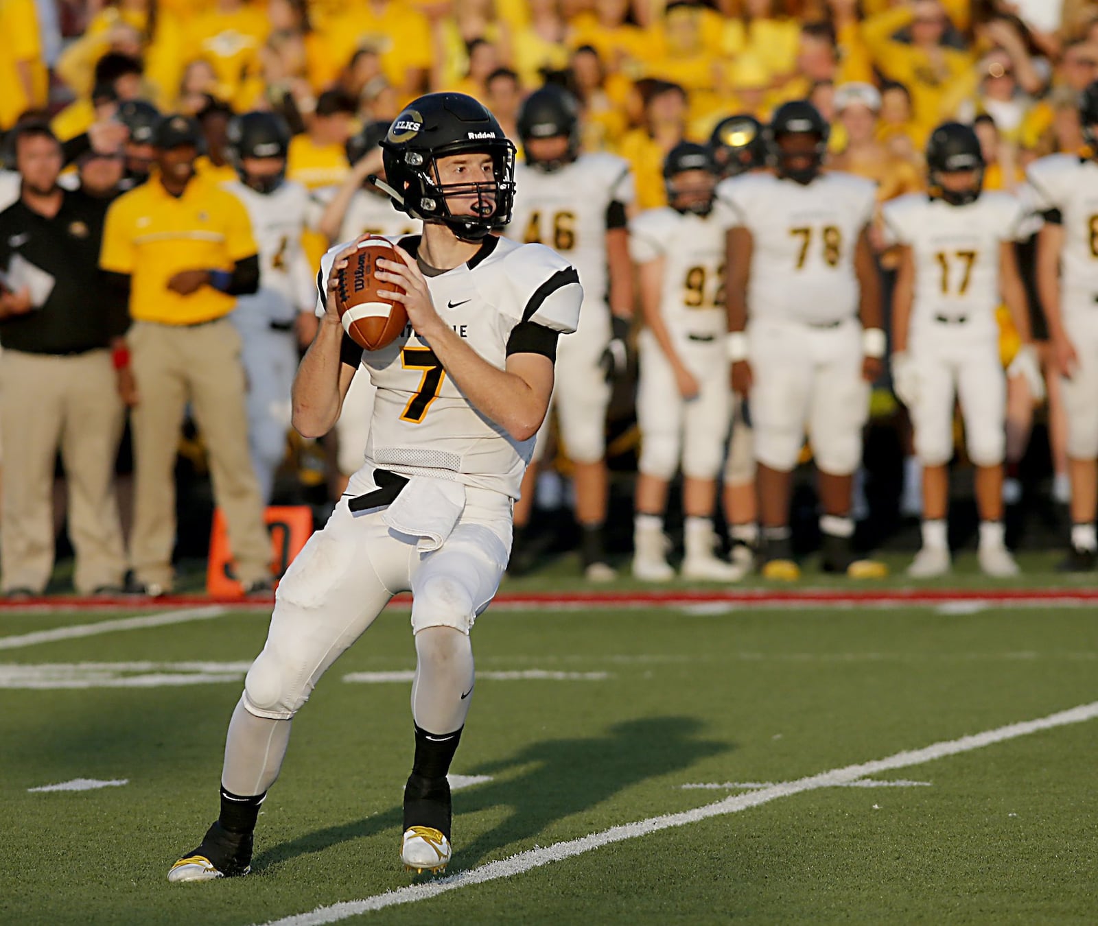 Centerville quarterback Alec Grandin drops back and looks for a receiver Friday night during the Elks’ 30-23 win over Fairfield in the Skyline Chili Crosstown Showdown at Fairfield Stadium. CONTRIBUTED PHOTO BY E.L. HUBBARD