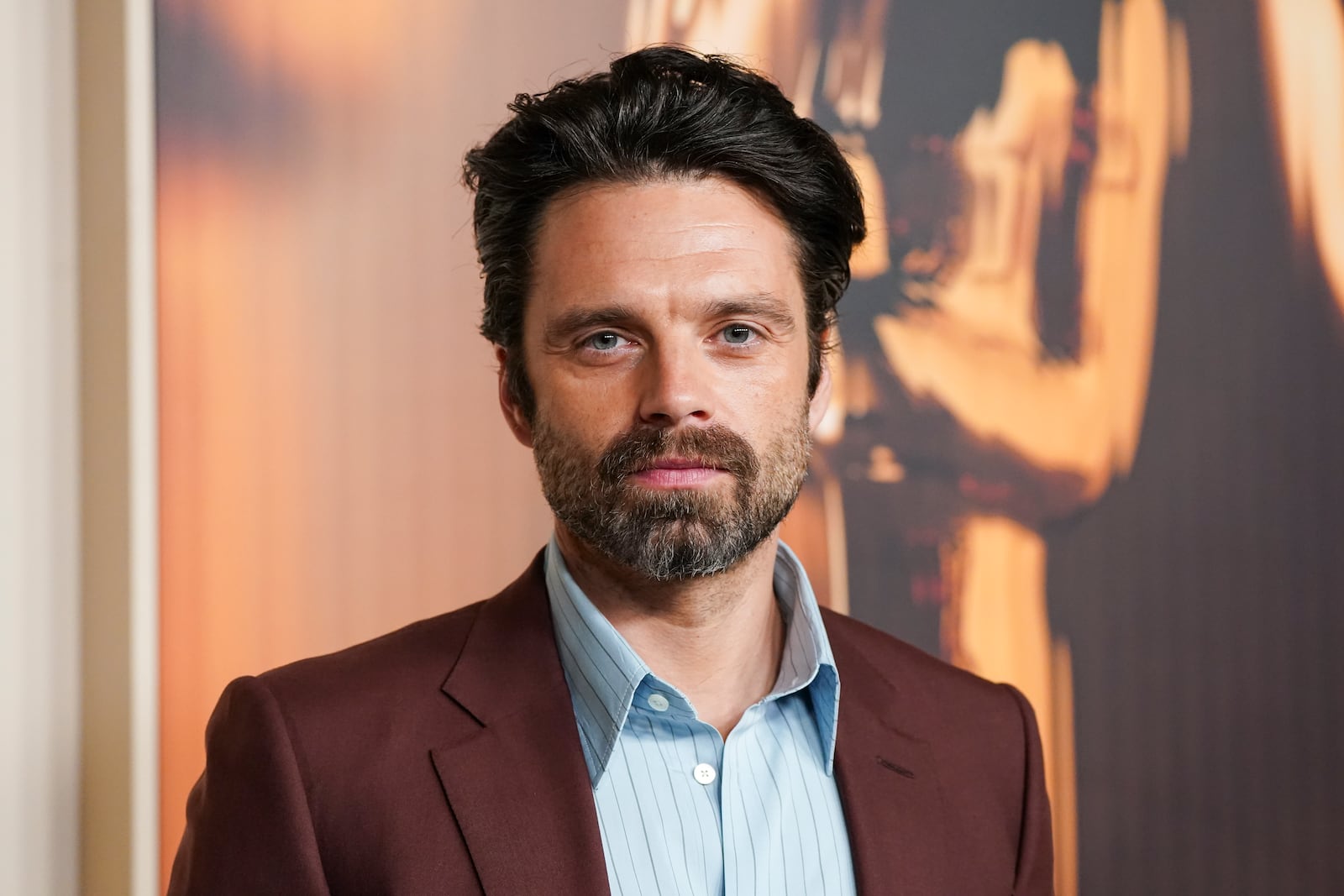 Sebastian Stan arrives at the Oscars Nominees Dinner on Tuesday, Feb. 25, 2025, at the Academy Museum of Motion Pictures in Los Angeles. (Photo by Jordan Strauss/Invision/AP)