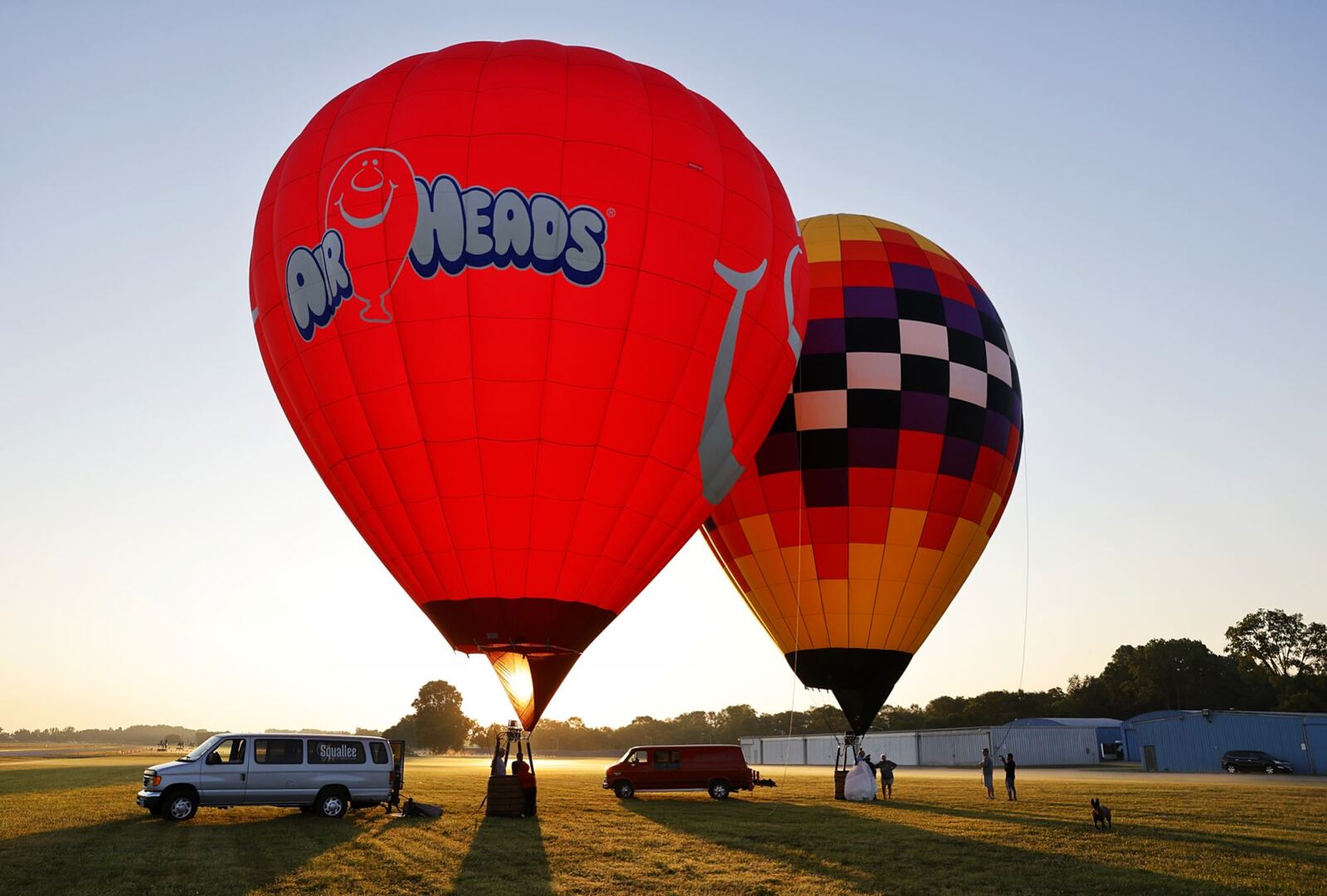 The Ohio Challenge hot air balloon festival is Friday and Saturday at Smith Park in Middletown. Sean Askren's hot air balloons, DILLAGAF and Airheads, were inflated during a preview event Thursday, July 14, 2022 at Middletown Regional Airport/Hook Field. NICK GRAHAM/STAFF