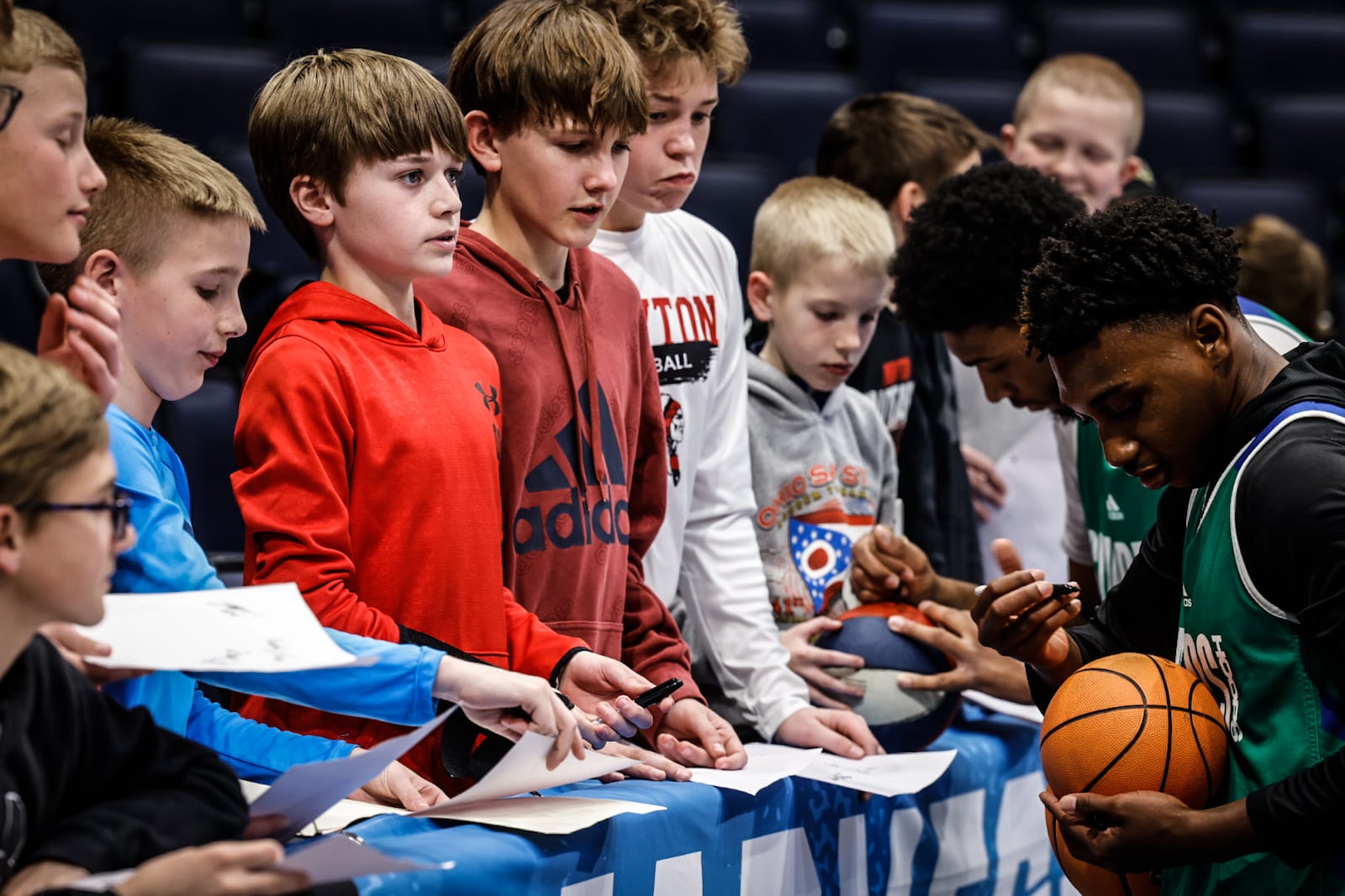 Texas AM players sign autographs and take selfies with fans at UDArena following practice for the First Four. Jim Noelker/Staff