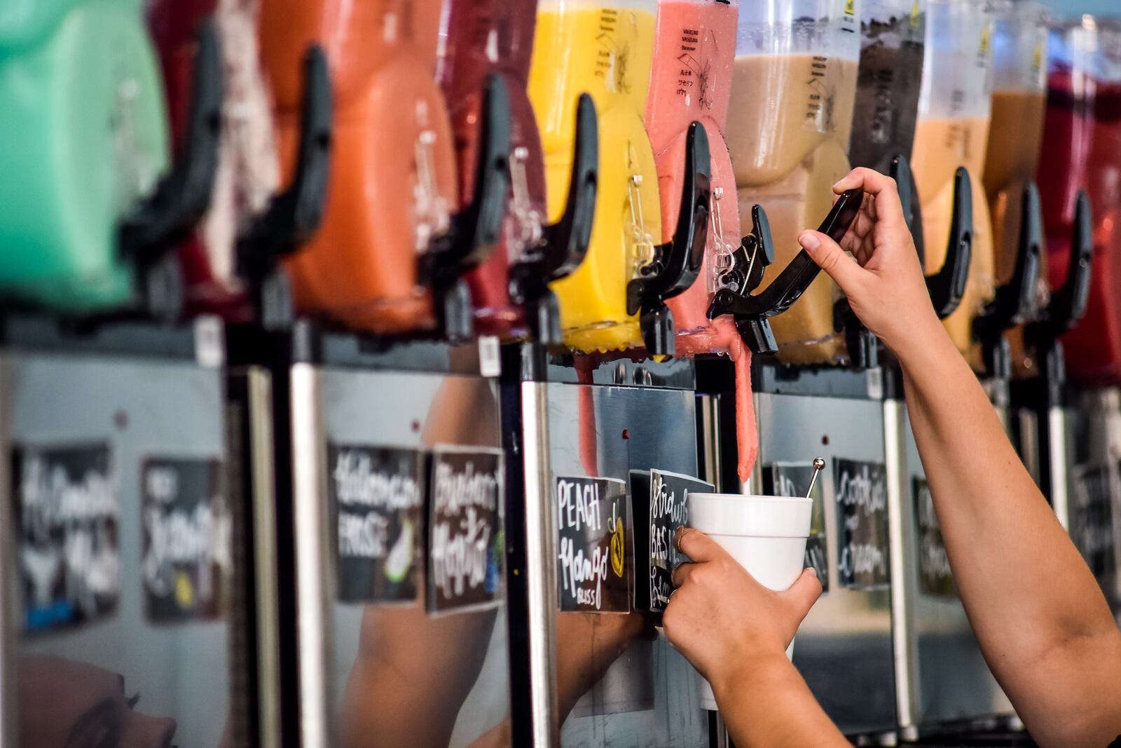 The Frost Factory is now open at Liberty Center in Liberty Township offering boozy and non-alcoholic slushy options in a variety of sizes. Most flavors are made from scratch with fresh fruit and can be customized with alcohol of choice. NICK GRAHAM / STAFF