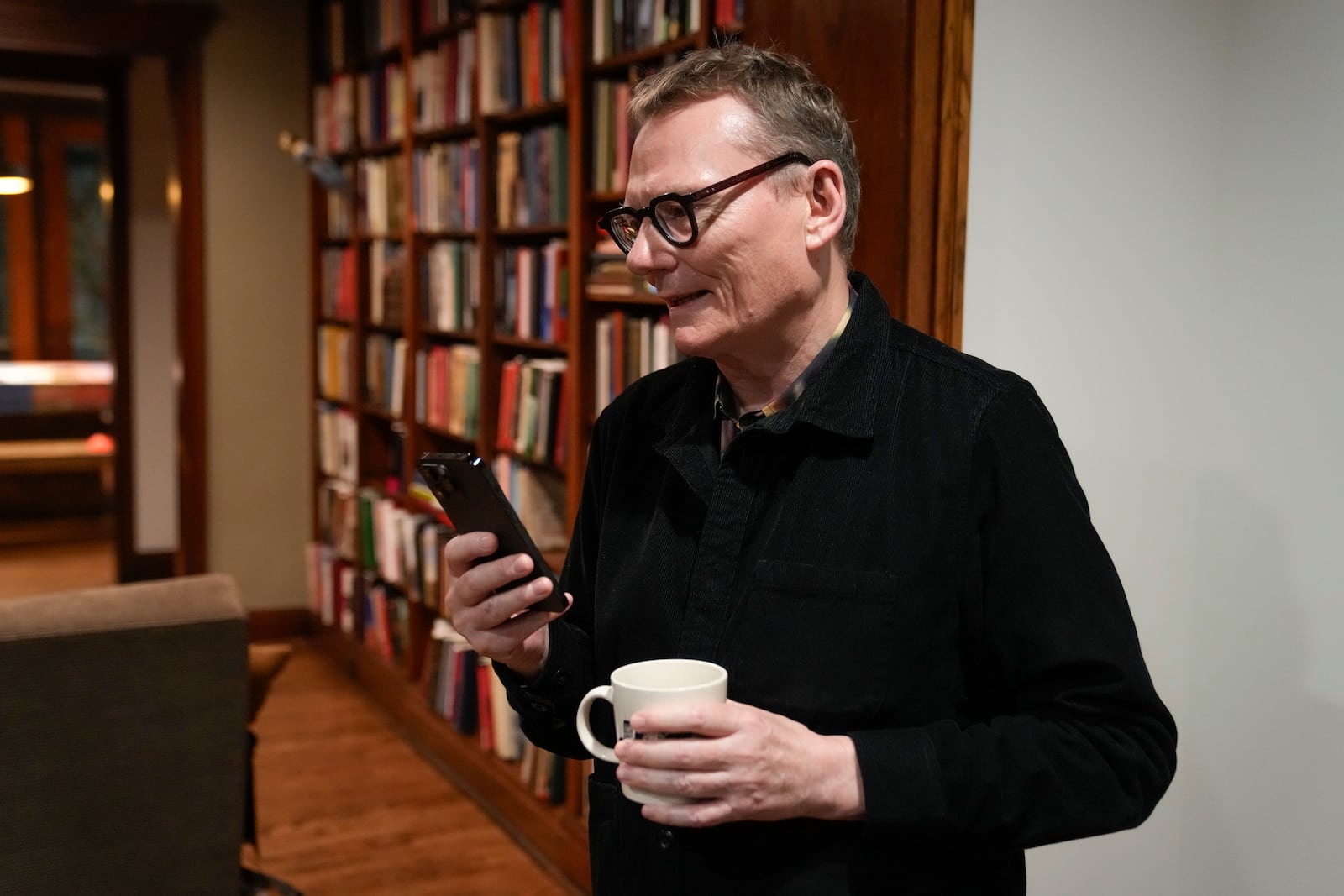 Nobel prize winner in Economics, James A. Robinson, gives an interview to the Associated Press from his home in the Hyde Park neighborhood of Chicago, Monday, Oct. 14, 2024. (AP Photo/Charles Rex Arbogast)