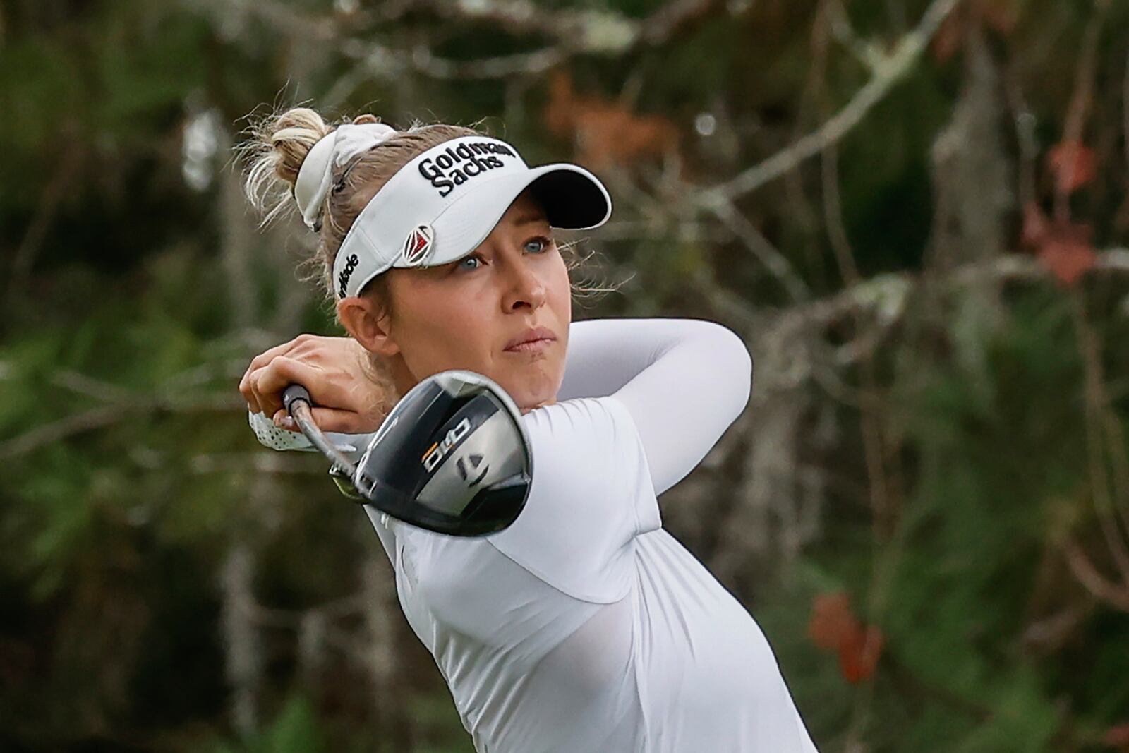 Nelly Korda finishes her drive on the ninth tee during the final round of the Hilton Grand Vacations Tournament of Champions LPGA golf tournament in Orlando, Fla., Sunday, Feb. 2, 2025. (AP Photo/Kevin Kolczynski)