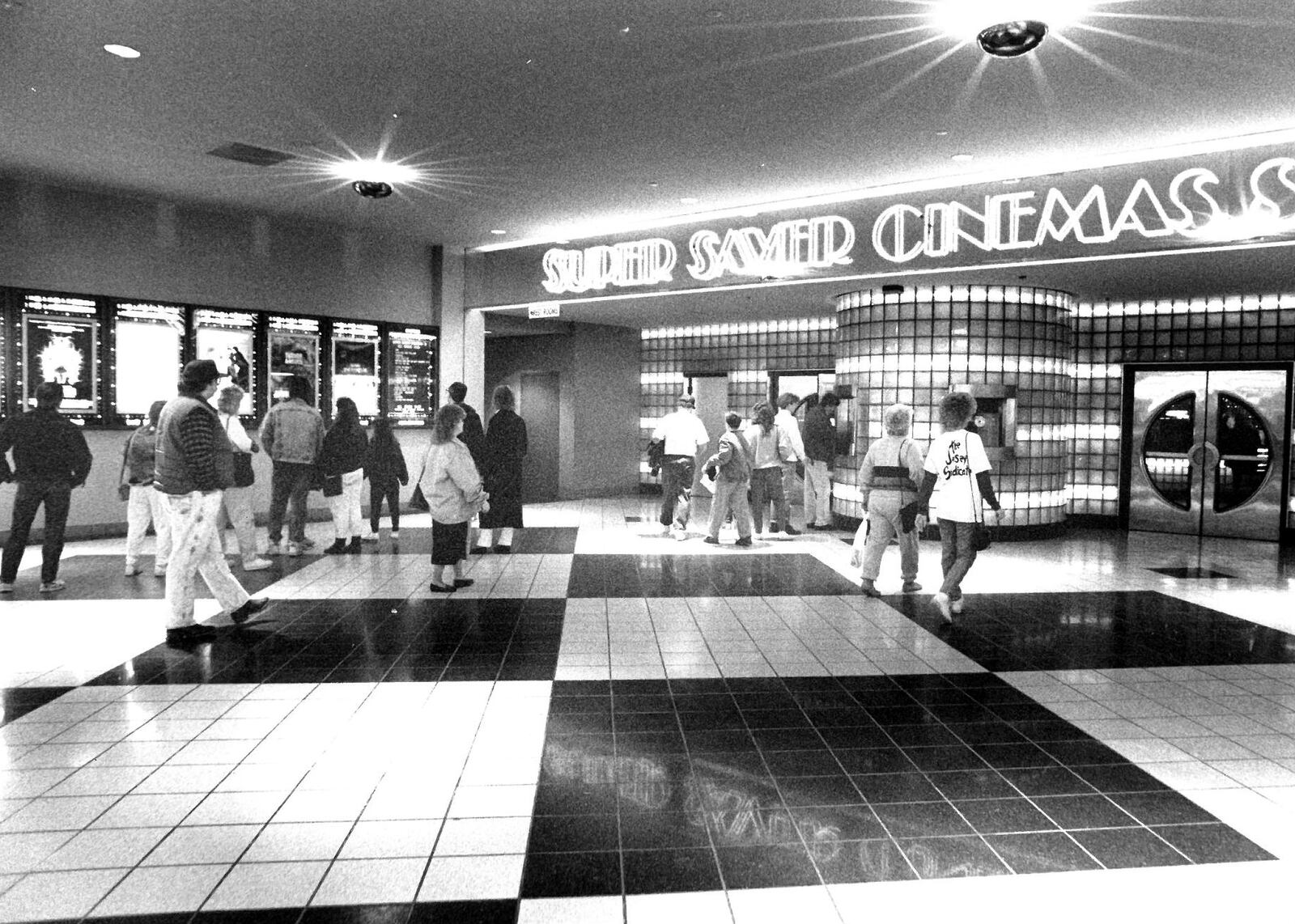 Customers going into Super Saver Cinema at Forest Fair Mall, Jan. 28, 1990. JOURNAL-NEWS PHOTO ARCHIVES