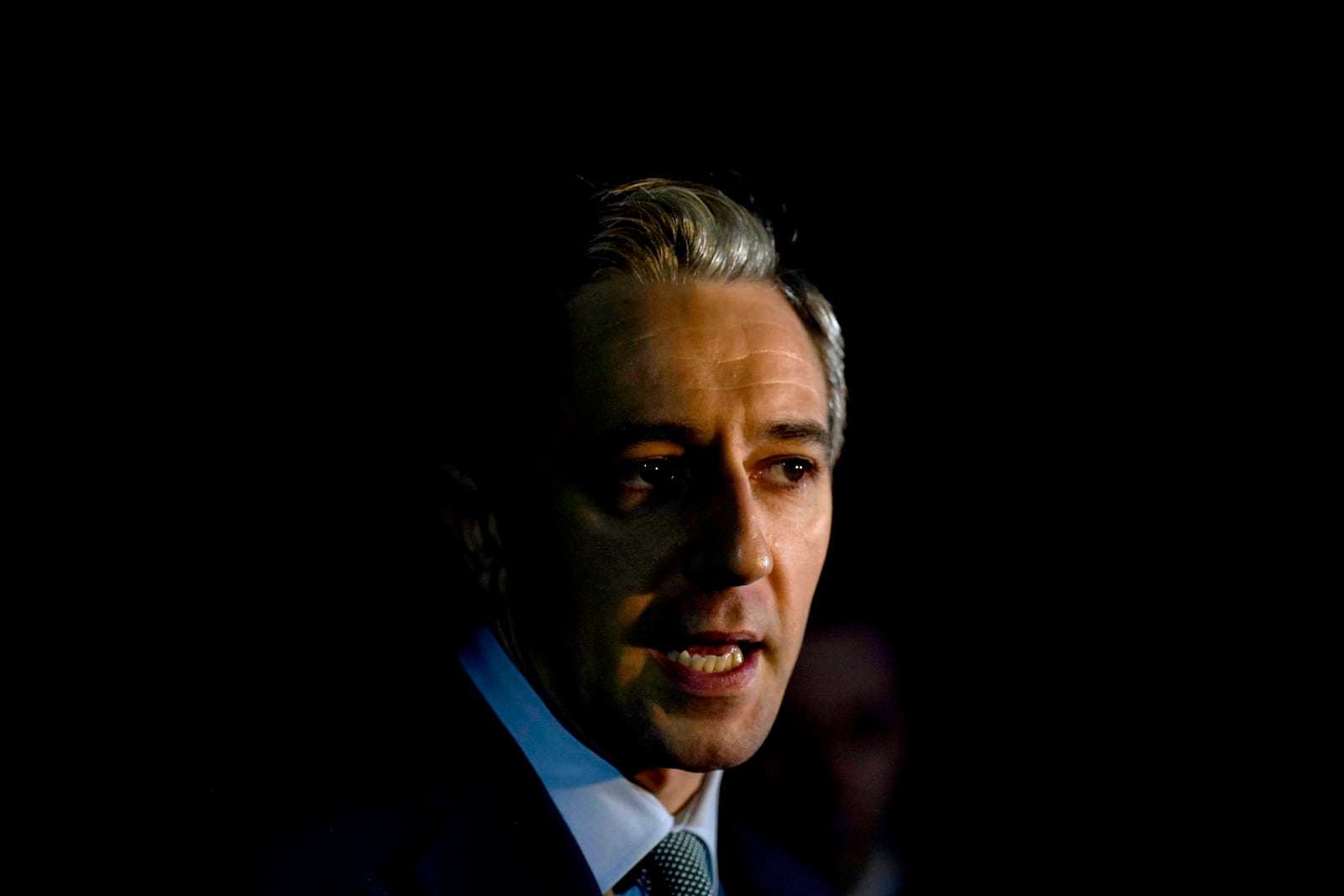 Irish Prime Minister and Fine Gael leader Simon Harris speaks to the media after casting his vote at Delgany National School, County Wicklow, as voters go to the polls for the 2024 General Election in Ireland, Friday Nov. 29, 2024. (Niall Carson/PA via AP)