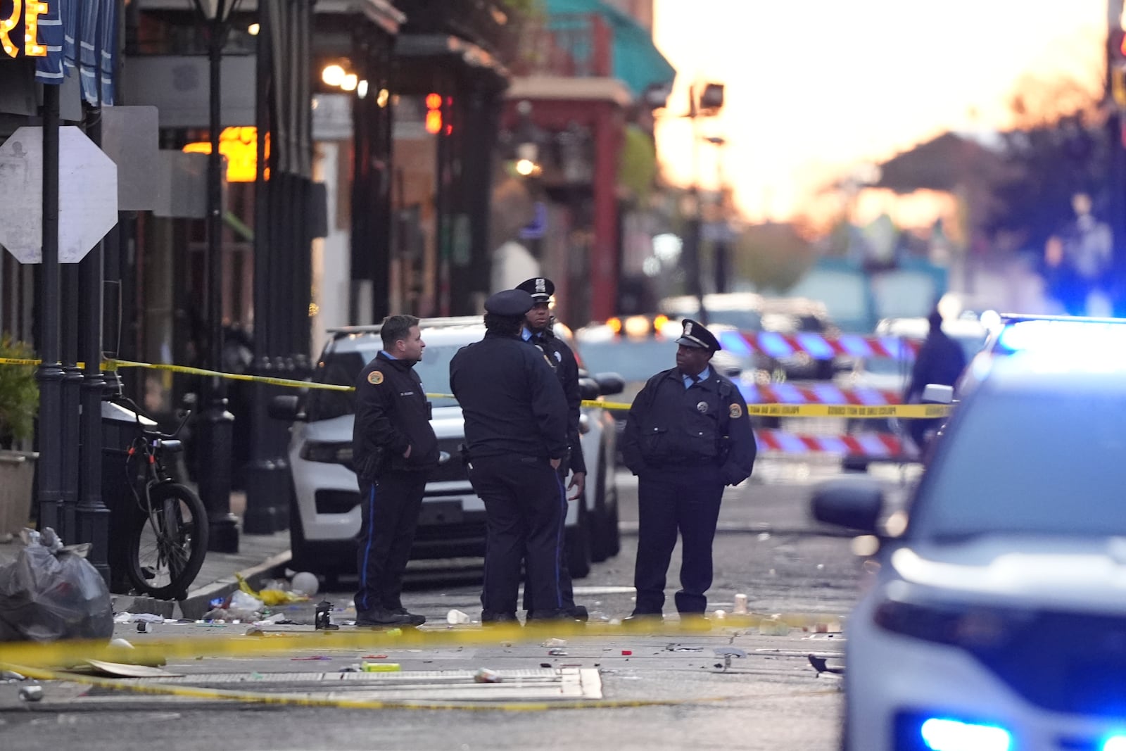 FILE - Emergency services attend to the scene on Bourbon Street after a vehicle drove into a crowd on New Orleans' Canal and Bourbon Street on Wednesday, Jan. 1, 2025. (AP Photo/Gerald Herbert, File)