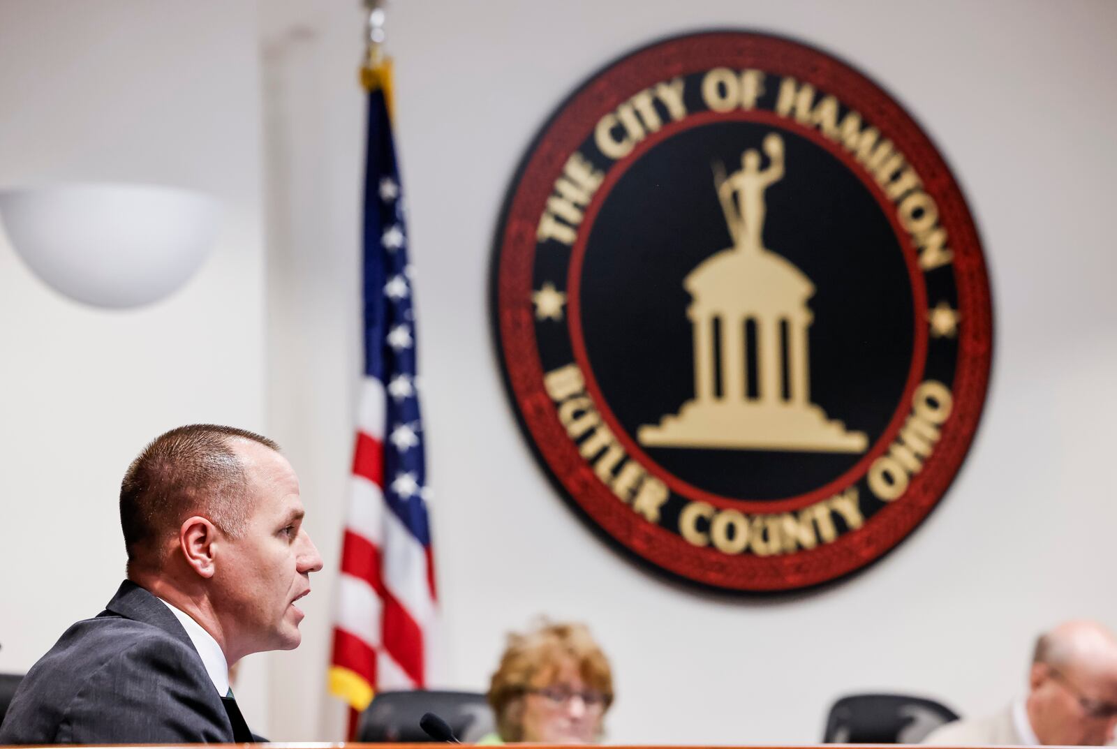 Former Hamilton Police Chief Craig Bucheit attends his first Hamilton city council meeting in his new role as city manager Wednesday, April 10, 2024. NICK GRAHAM/STAFF