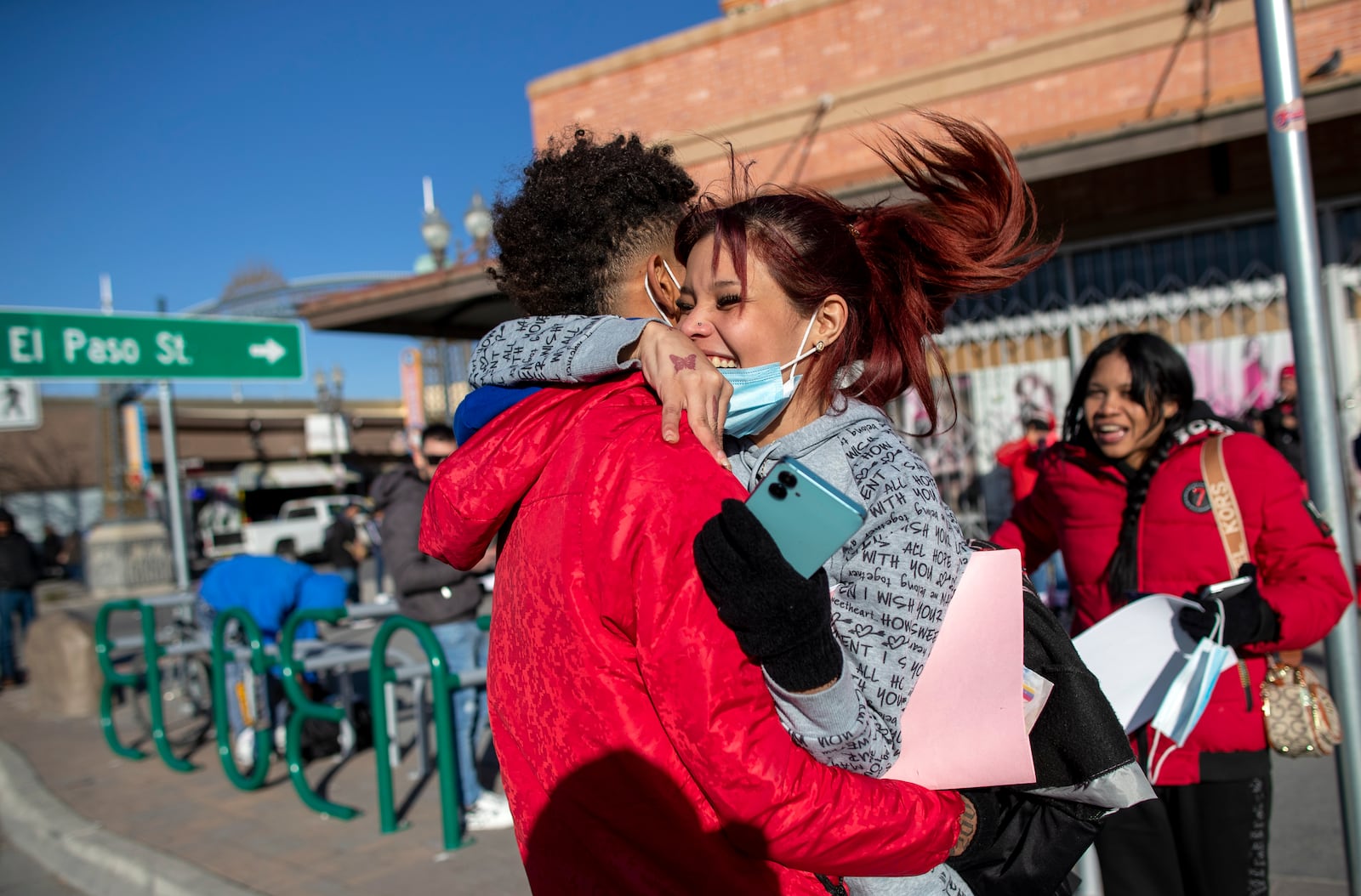 Venezuelan migrants Daniela Medina, right, and Oldris Rodriguez hug in celebration after entering the United States from Ciudad Juarez, Mexico through the Paso del Norte bridge, Monday, Jan. 20, 2025 in El Paso, Texas. (AP Photo/Andres Leighton)