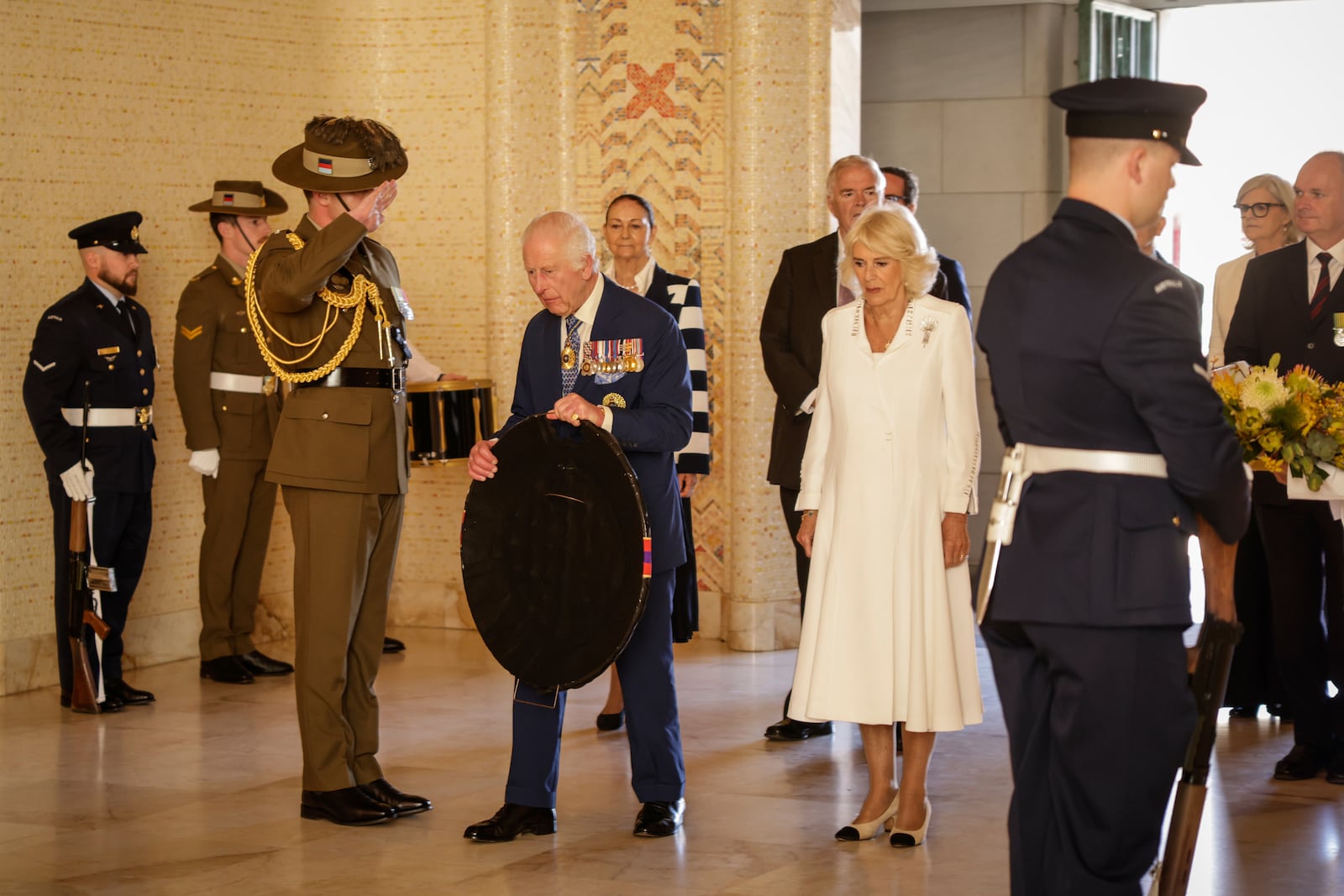 King Charles III and Queen Camilla arrive to lay a wreath at the Australian War Memorial in Canberra, Australia, Monday, Oct. 21, 2024. (Brook Mitchell/ Pool Photo via AP)