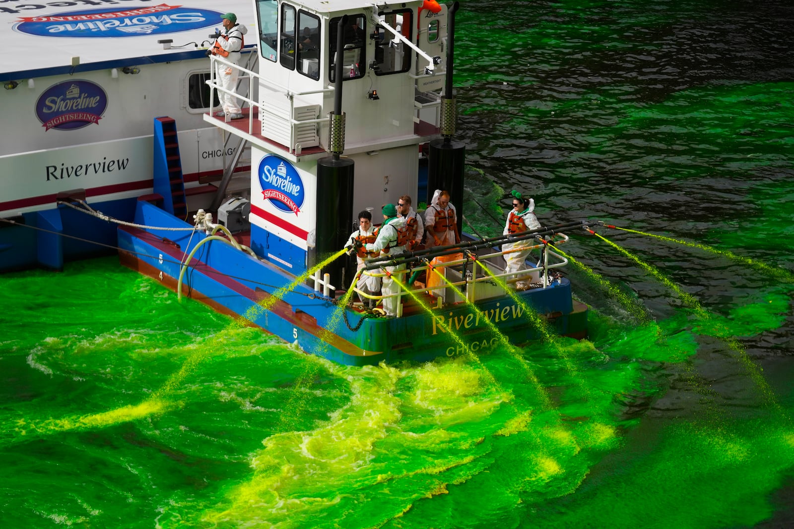 The Chicago River is dyed green as part of annual St. Patrick's Day festivities Saturday, March 15, 2025, in Chicago. (AP Photo/Erin Hooley)