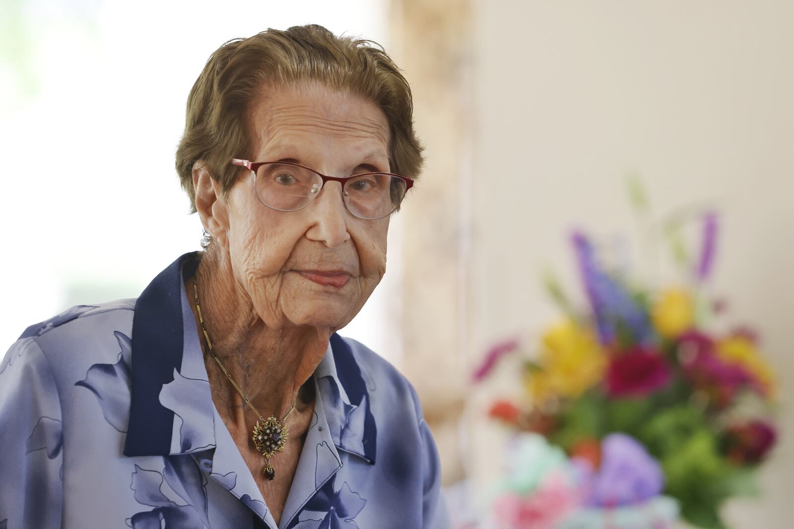 Mary McComb celebrates her 103rd birthday with a party at Bradford Place Wednesday, July 7 in Hamilton. NICK GRAHAM / STAFF