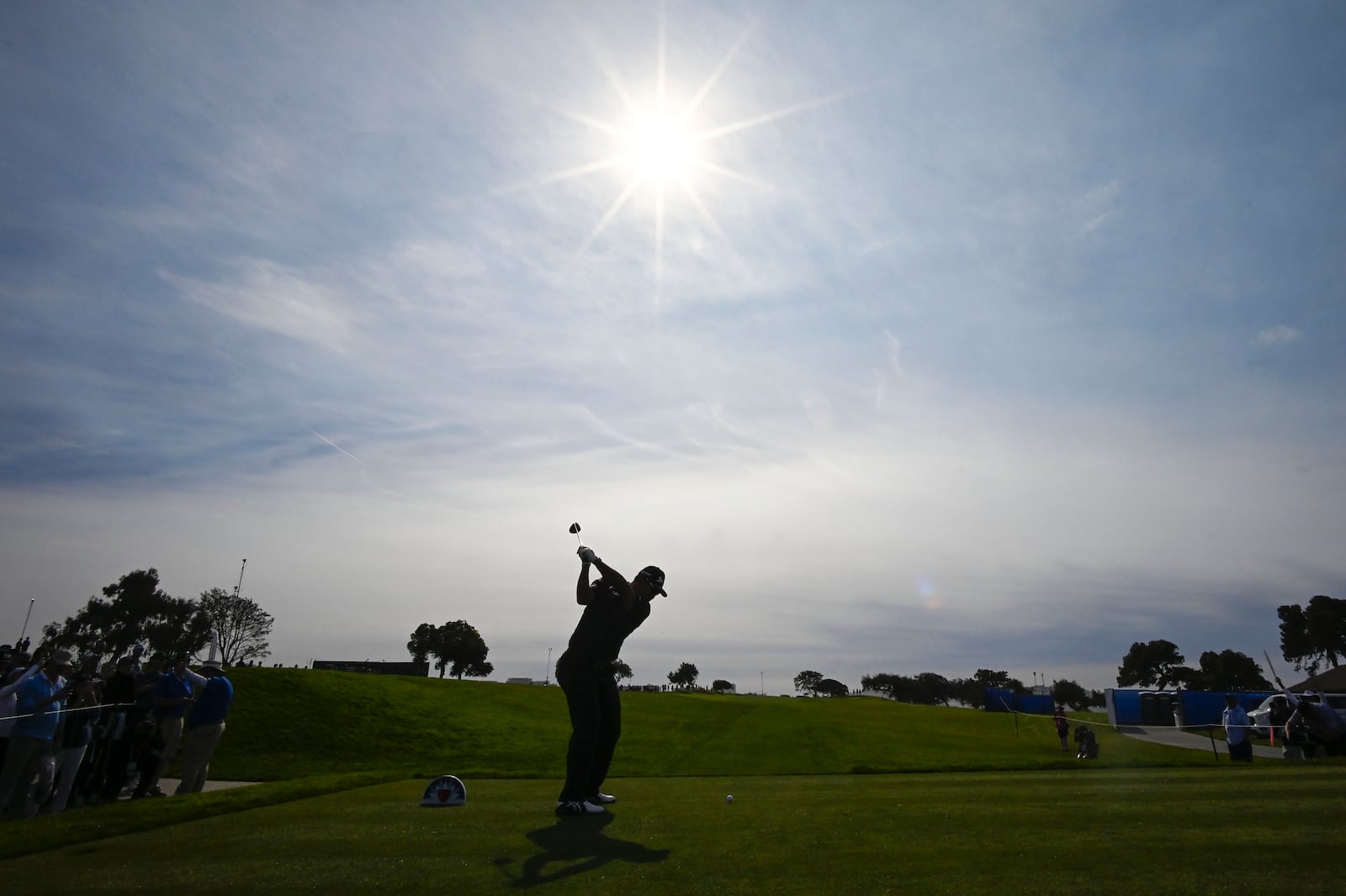 Hideki Matsuyama hits from the second tee of the South Course at Torrey Pines during the first round of the Farmers Insurance Open golf tournament Wednesday, Jan. 22, 2025, in San Diego. (AP Photo/Denis Poroy)