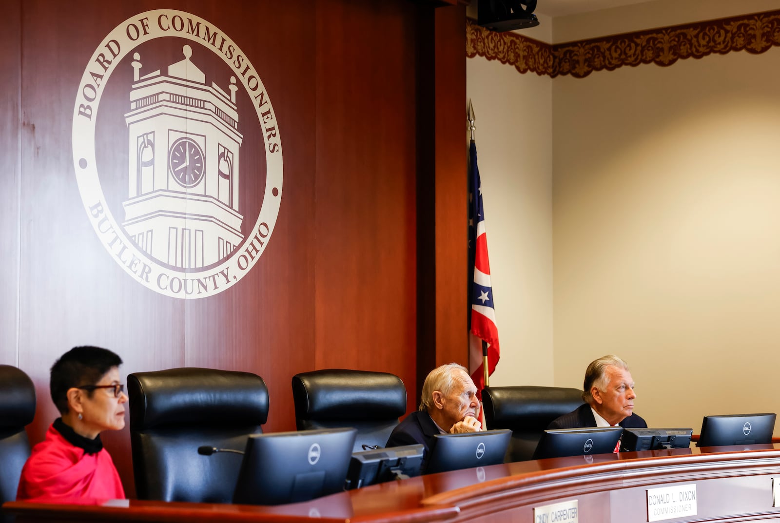 Butler County Administrator Judi Boyko, left, and Commissioners Don Dixon and T.C. Rogers listen to public comments about a Butler County Emergency Management Agency during a meeting Monday, Dec. 23, 2024 in Hamilton. NICK GRAHAM/STAFF