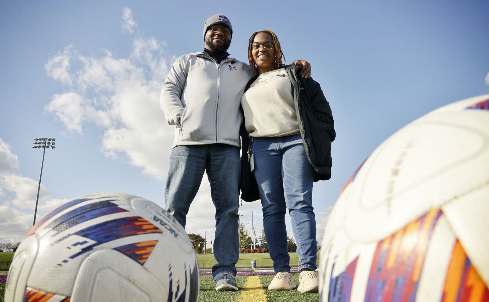 Middletown grad Zayion Hyman, right, played soccer for the Middies while she was in school and was coached by her father, Jeremy Hyman, left. Now she teaching at Highview and is assistant coach for the same team she played on. NICK GRAHAM/STAFF