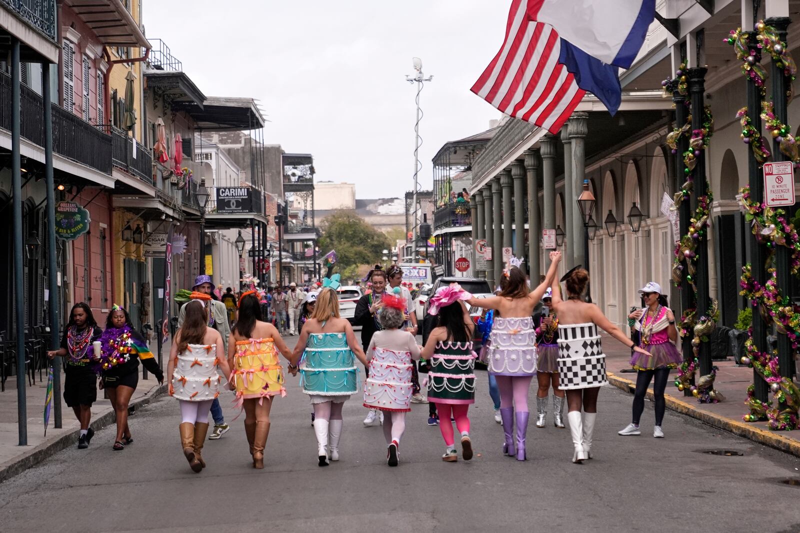 People celebrate on Mardi Gras Day, Tuesday, March 4, 2025 in New Orleans. (AP Photo/Gerald Herbert)