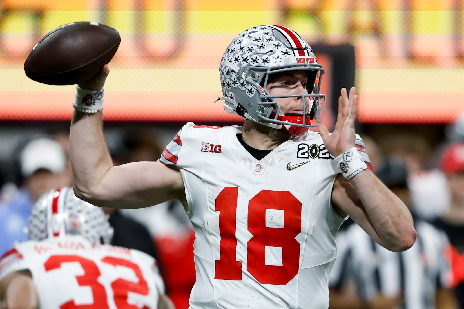 Ohio State quarterback Will Howard passes against Notre Dame during second half of the College Football Playoff national championship game Monday, Jan. 20, 2025, in Atlanta. (AP Photo/Butch Dill)