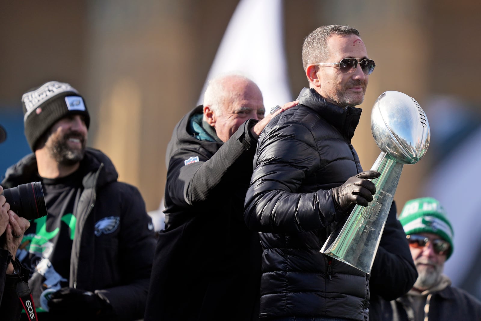 Philadelphia Eagles general manager Howie Roseman holds up the Lombardi trophy as he speaks during the team's NFL football Super Bowl 59 parade and celebration, Friday, Feb. 14, 2025, in Philadelphia. (AP Photo/Matt Rourke)