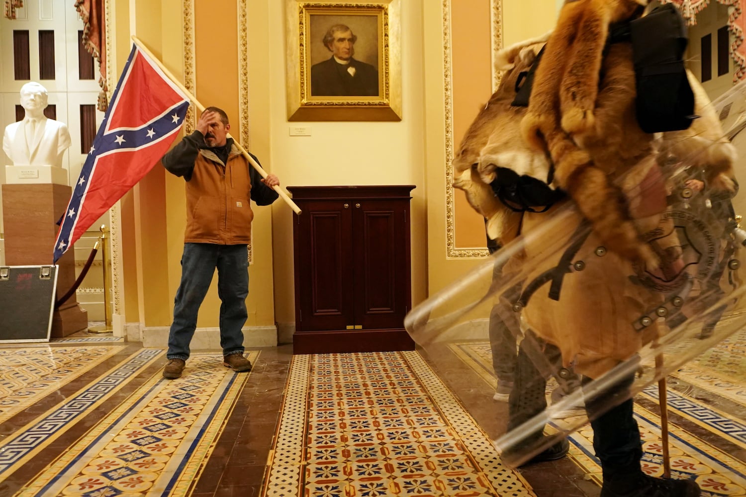 People protesting the presidential election results inside the Capitol in Washington on Wednesday, Jan. 6, 2020. (Erin Schaff/The New York Times)