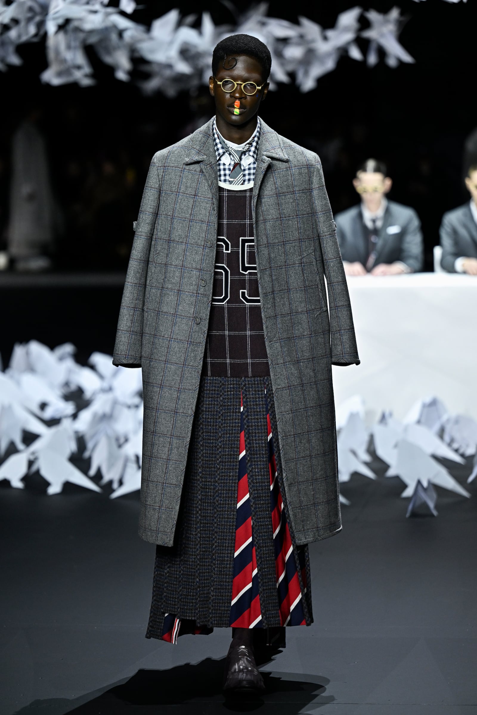 A model walks the runway during the Thom Browne Fall/Winter 2025 fashion show as part of New York Fashion Week on Tuesday, Feb. 11, 2025, at The Shed in New York. (Photo by Evan Agostini/Invision/AP)