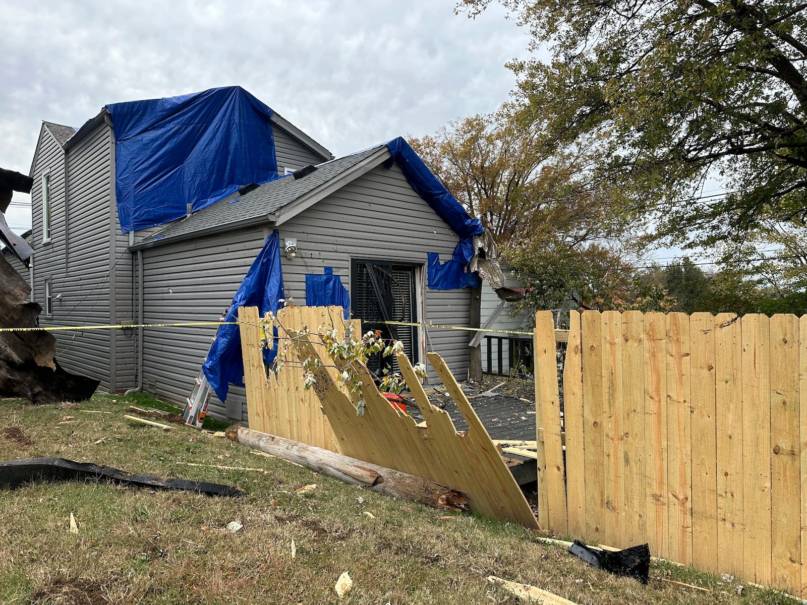 A residential fence near a Louisville, Kentucky, plant that exploded is pictured on Wednesday, Nov. 13, 2024. (AP Photo/Dylan Lovan)