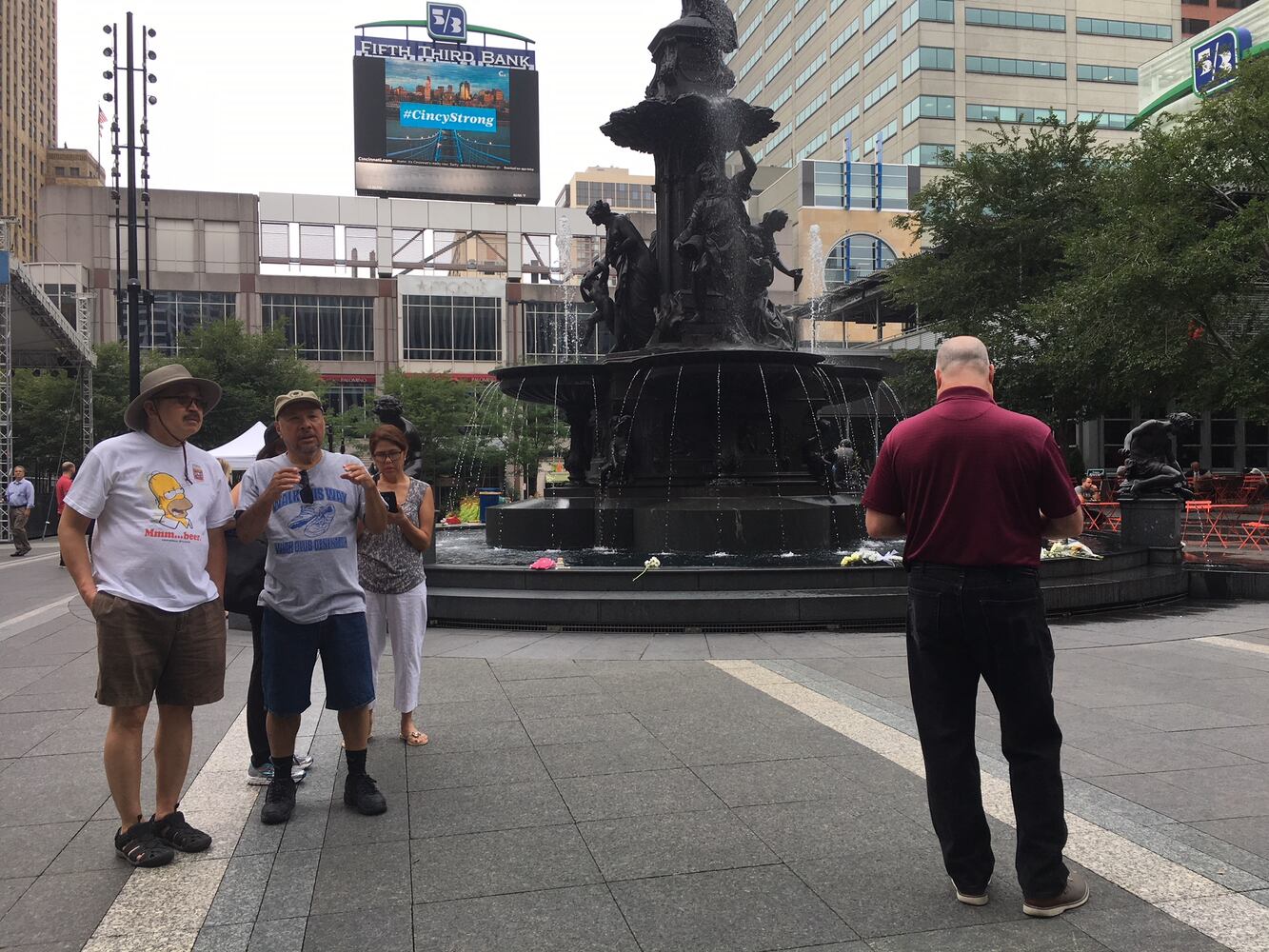 Photos: Locals honor three killed day after Fountain Square shooting