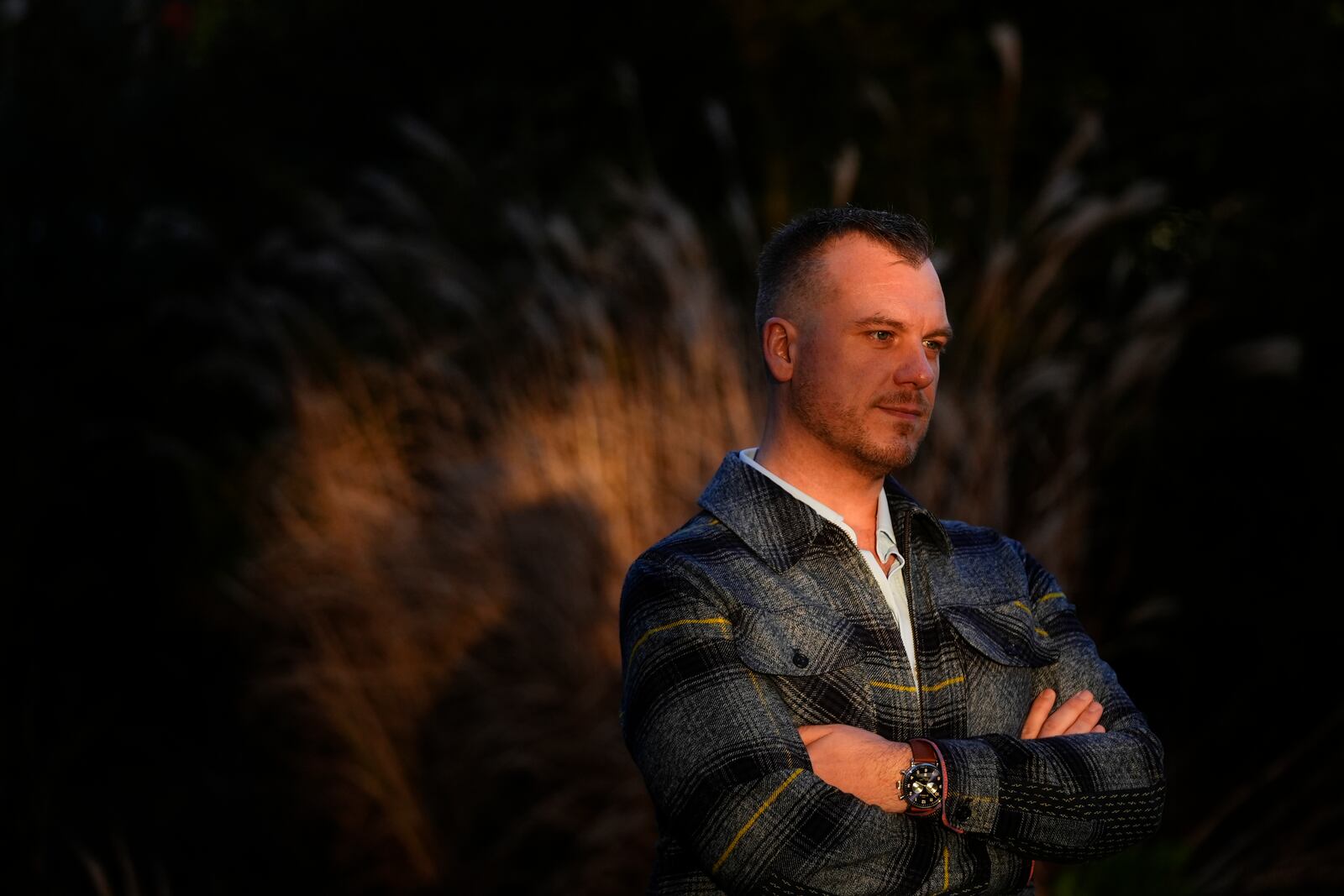 Recreational rugby player Sean McDowell, whose SafeSport case investigator Jason Krasley was fired after being arrested for stealing drug money in his previous job as a police officer, poses for a portrait Wednesday, Dec. 18, 2024, in Seattle. (AP Photo/Lindsey Wasson)