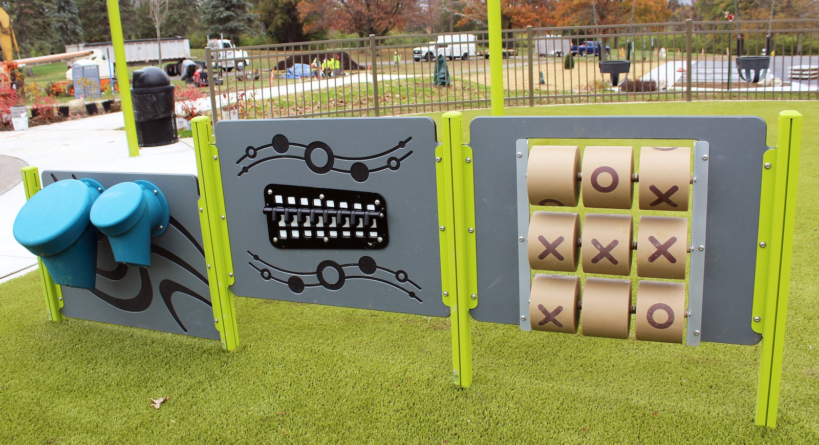 Situated on artificial turf, the 70-foot by 200-foot playground area in Harbin Park in Fairfield sits adjacent to a new splash pad expected to open next spring after several delays in getting permits from the Ohio Department of Health. The playground features two separate areas — one with equipment targeted for children ages 6-12; the second aimed at 2- to 5-year-olds. CONTRIBUTED