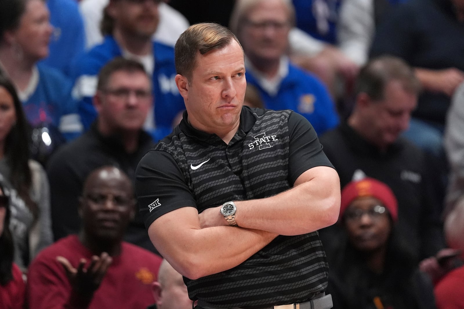 Iowa State head coach T.J. Otzelberger watches during the first half of an NCAA college basketball game against Kansas, Monday, Feb. 3, 2025, in Lawrence, Kan. (AP Photo/Charlie Riedel)