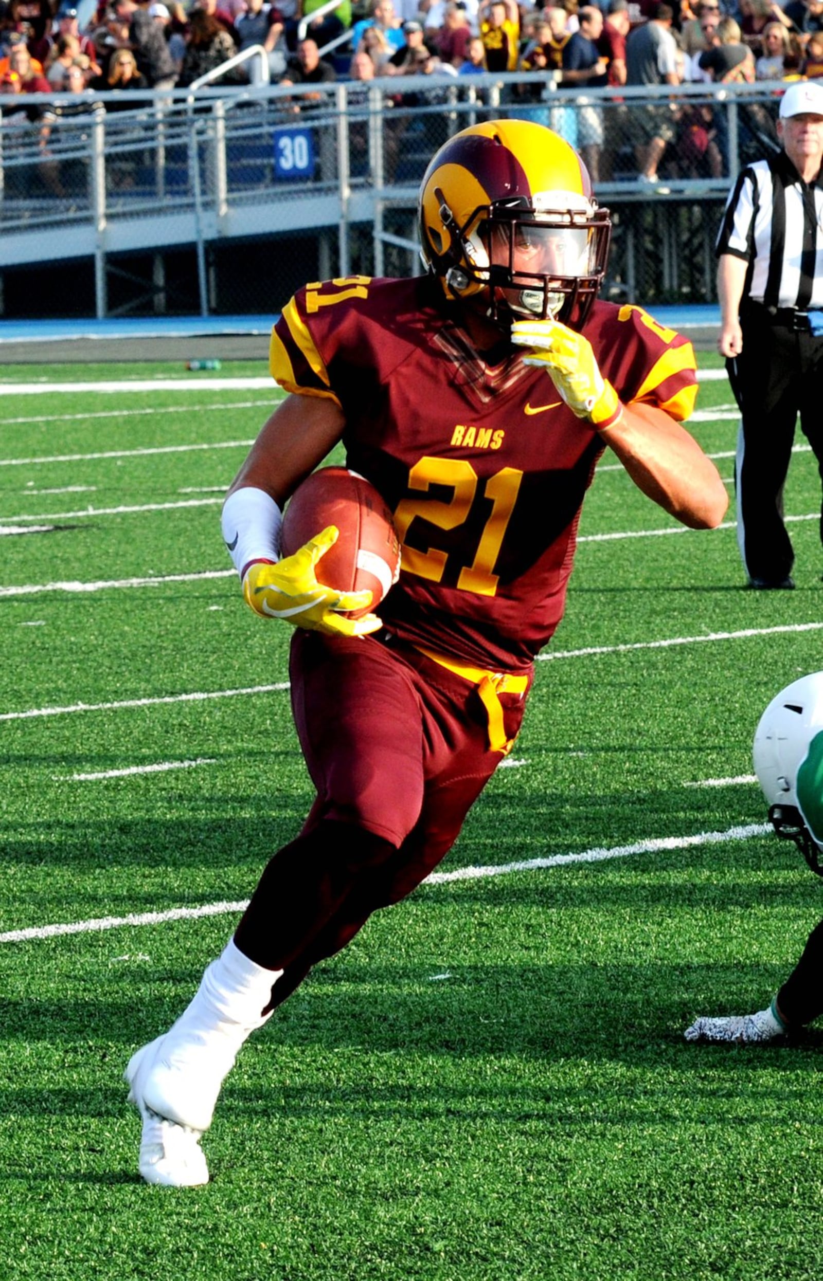 Jacob Brewer heads up the field on a run for Ross on Friday night at Hamilton’s Virgil Schwarm Stadium. Brewer had the lone touchdown in a 36-6 loss to Badin in the Skyline Chili Crosstown Showdown. CONTRIBUTED PHOTO BY DAVID A. MOODIE