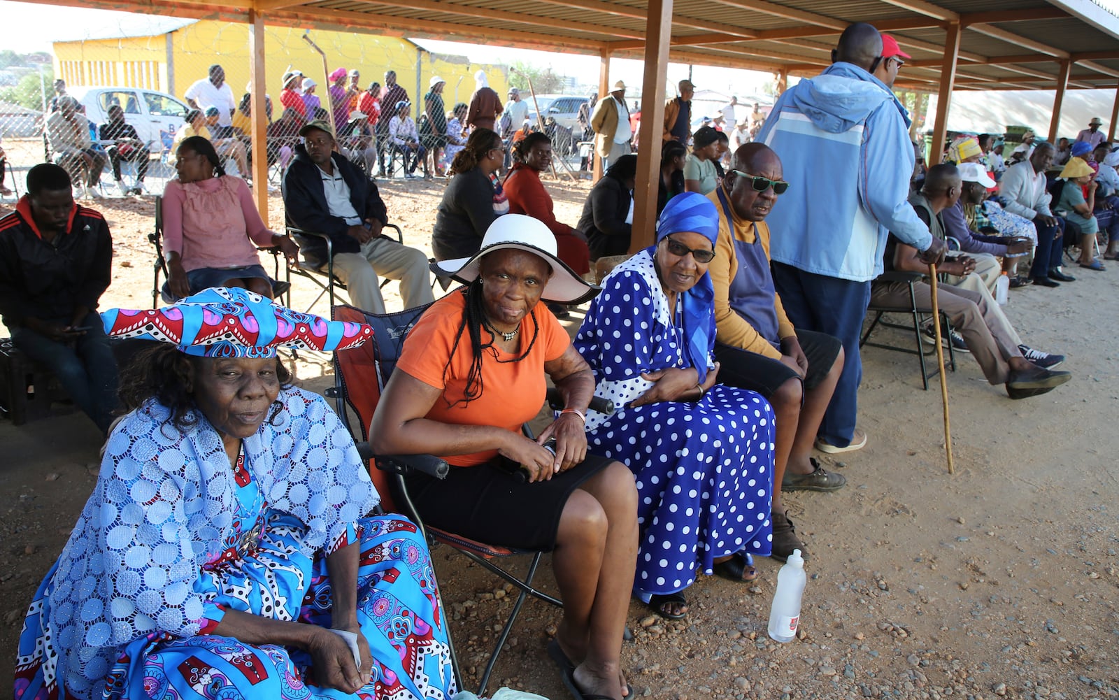 Namibians queue to cast their votes in a presidential election in Windhoek, Namibia Wednesday, Nov. 27, 2024. (AP Photo/Dirk Heinrich)