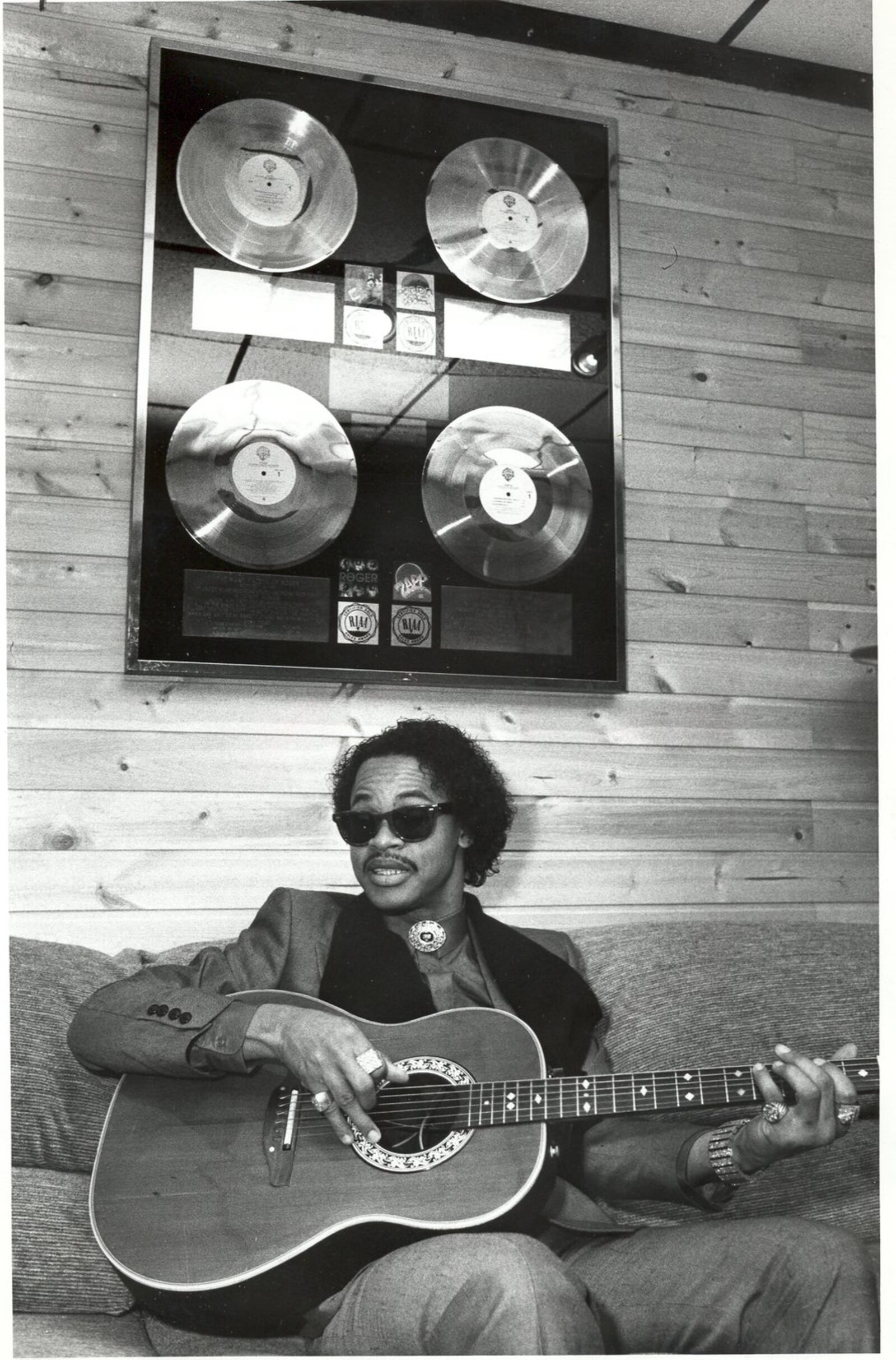 Roger Troutman, leader of the band Zapp, in his studio with four gold records. Troutman, a musician and leader of the band Zapp, was shot and killed by his brother, Larry Troutman, on April 25, 1999. DAYTON DAILY NEWS ARCHIVE PHOTO