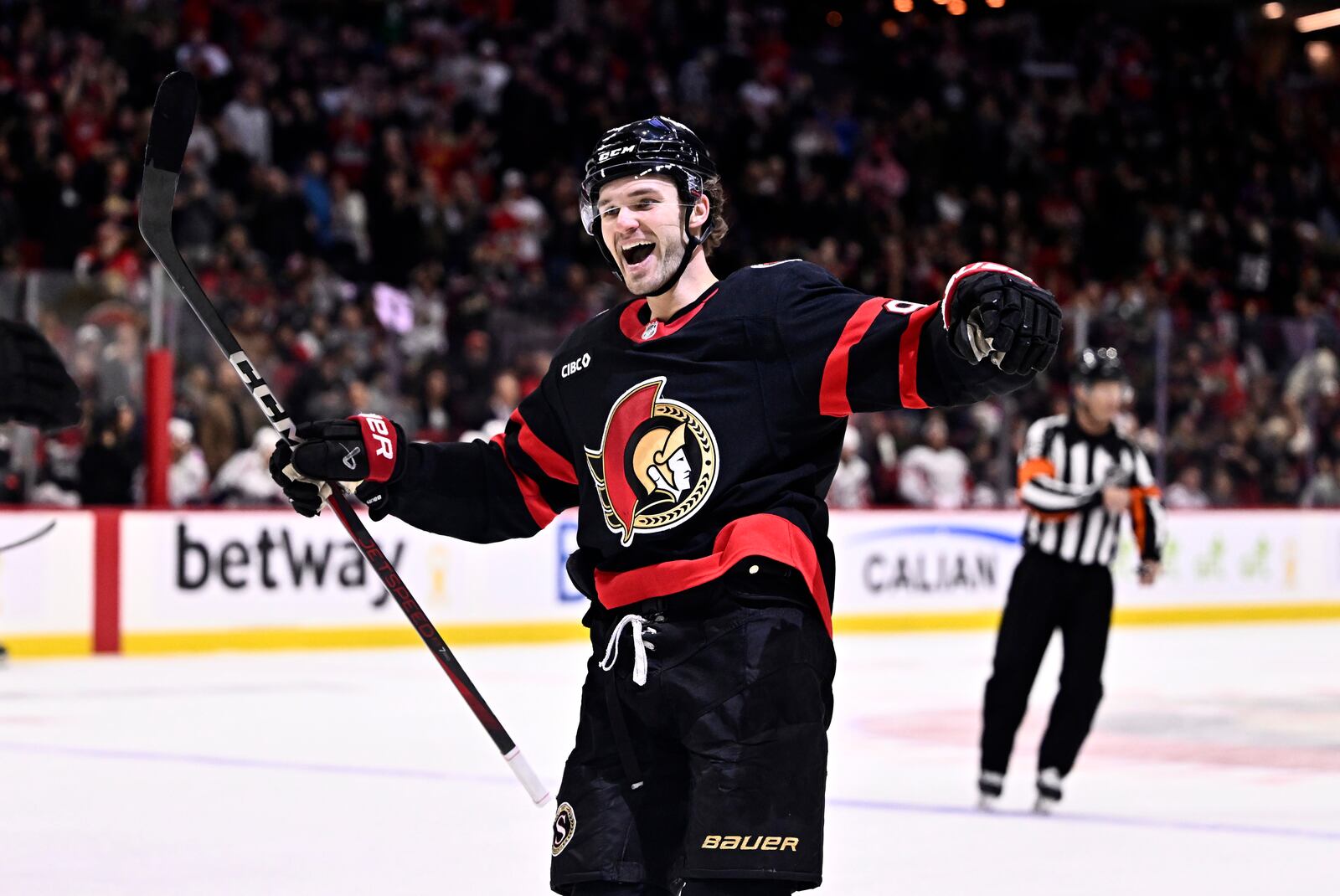 Ottawa Senators' Josh Norris (9) celebrates a goal by Shane Pinto (12), not shown, during second period NHL hockey action against the Washington Capitals in Ottawa, on Thursday, Jan. 30, 2025. (Justin Tang/The Canadian Press via AP)