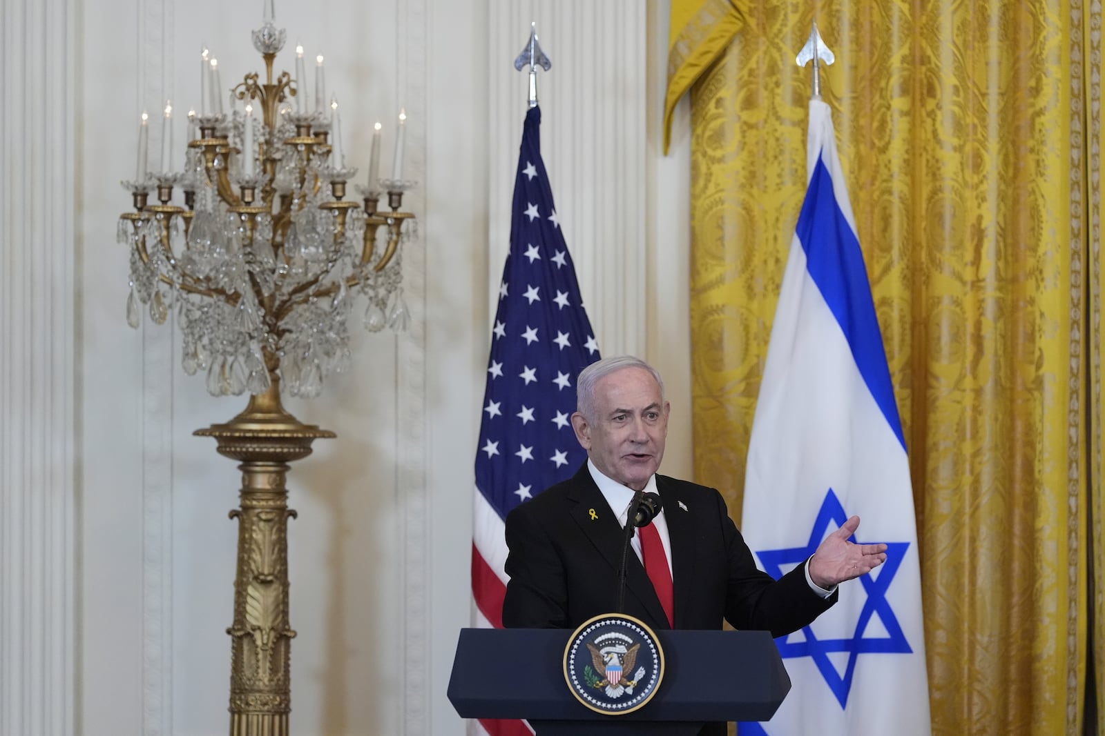 Israeli Prime Minister Benjamin Netanyahu speaks during a news conference with President Donald Trump in the East Room of the White House, Tuesday, Feb. 4, 2025, in Washington. (AP Photo/Alex Brandon)