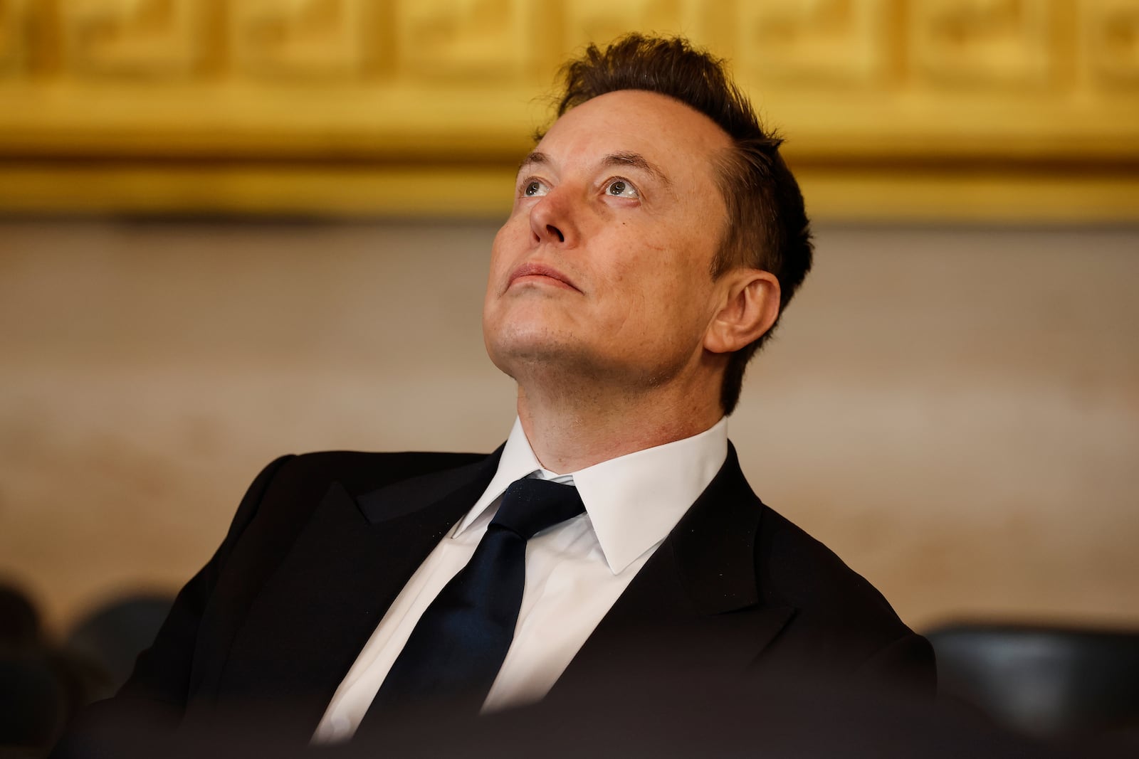 Elon Musk arrives before the 60th Presidential Inauguration in the Rotunda of the U.S. Capitol in Washington, Monday, Jan. 20, 2025. (Chip Somodevilla/Pool Photo via AP)