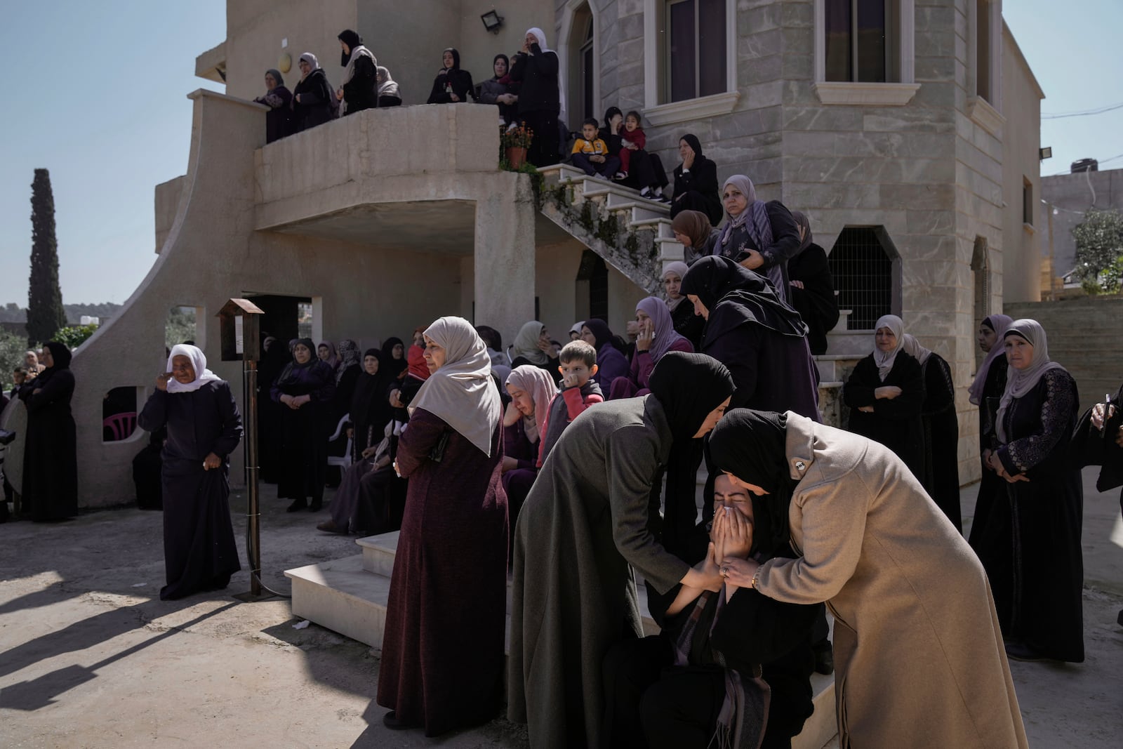 Palestinians attend the funeral of Ahmed Salah, 32, in the village of Kafr Dan, who died after being struck by an Israeli military vehicle in what the army said was an accident during an operation in the occupied West Bank. (AP Photo/Majdi Mohammed)