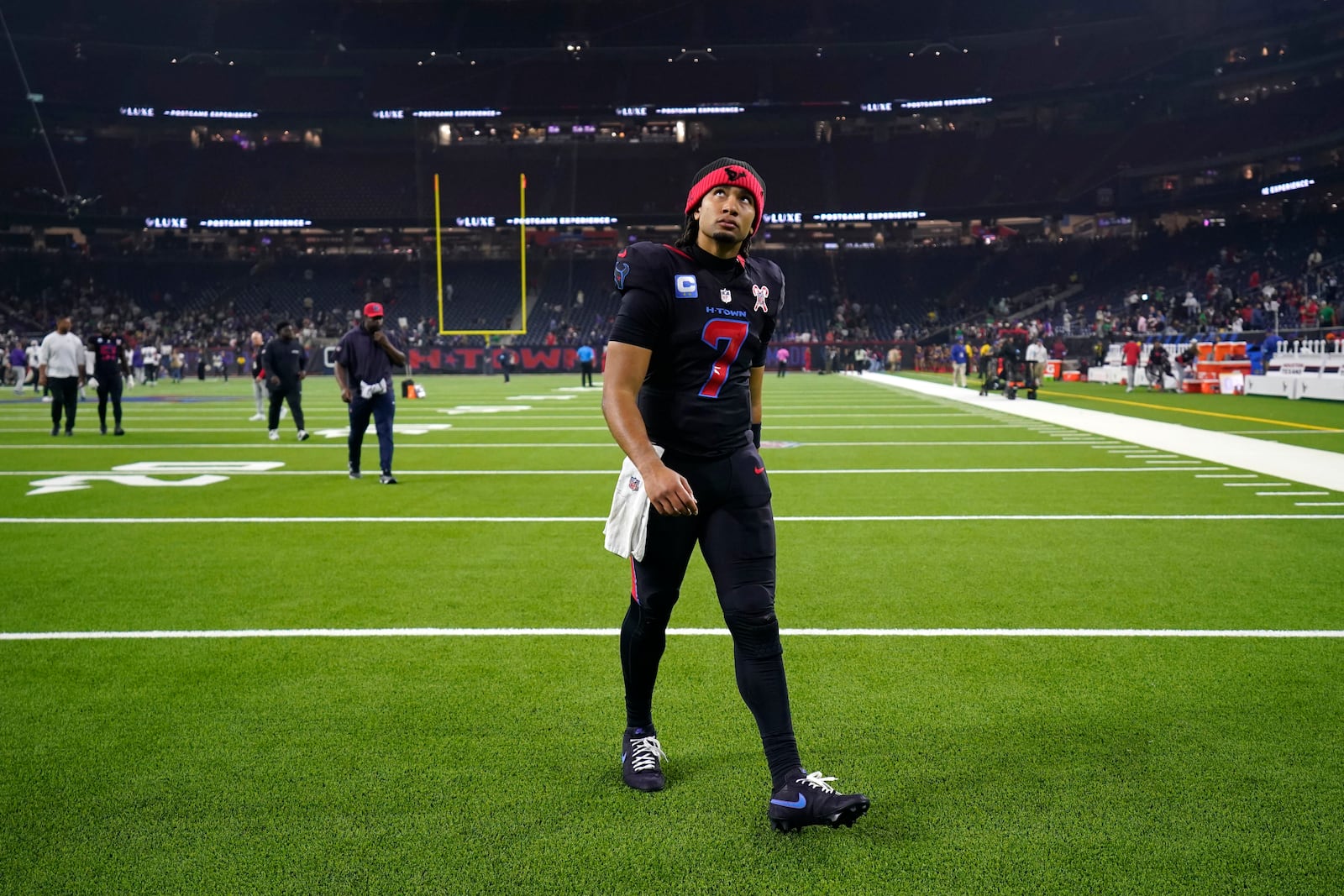 Houston Texans quarterback C.J. Stroud walks off the field after an NFL football game against the Baltimore Ravens, Wednesday, Dec. 25, 2024, in Houston. (AP Photo/Eric Christian Smith)